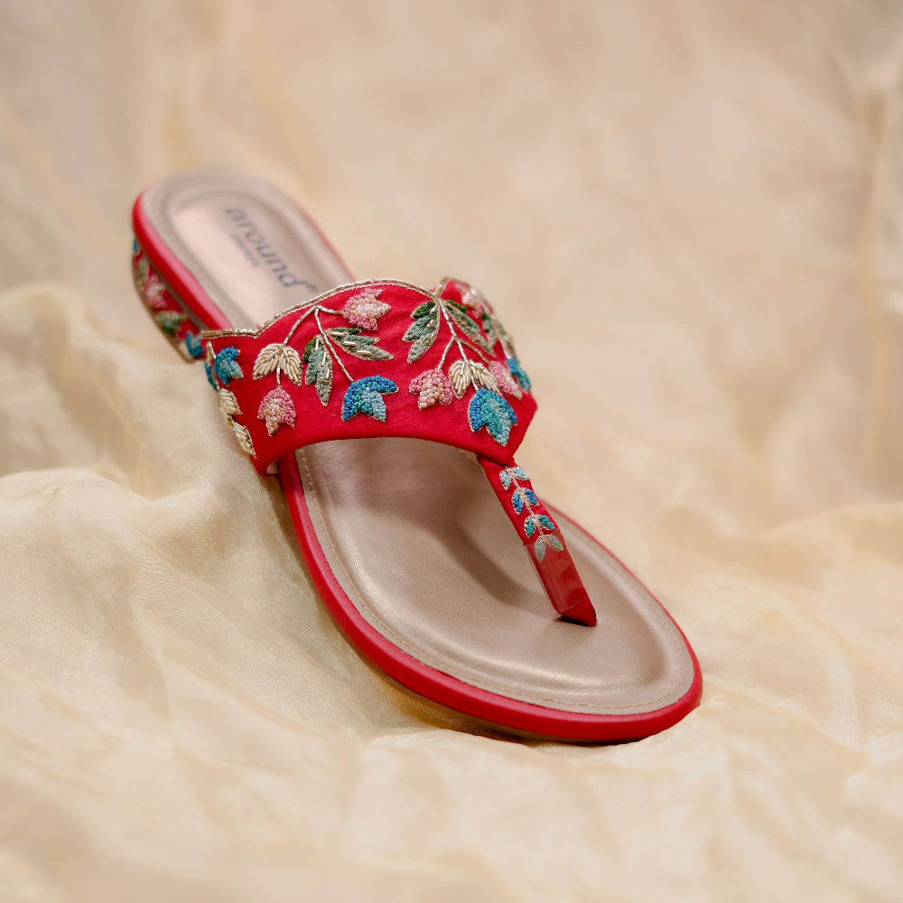 Red occasion sandals with blooming vine patterns and comfortable low heel
