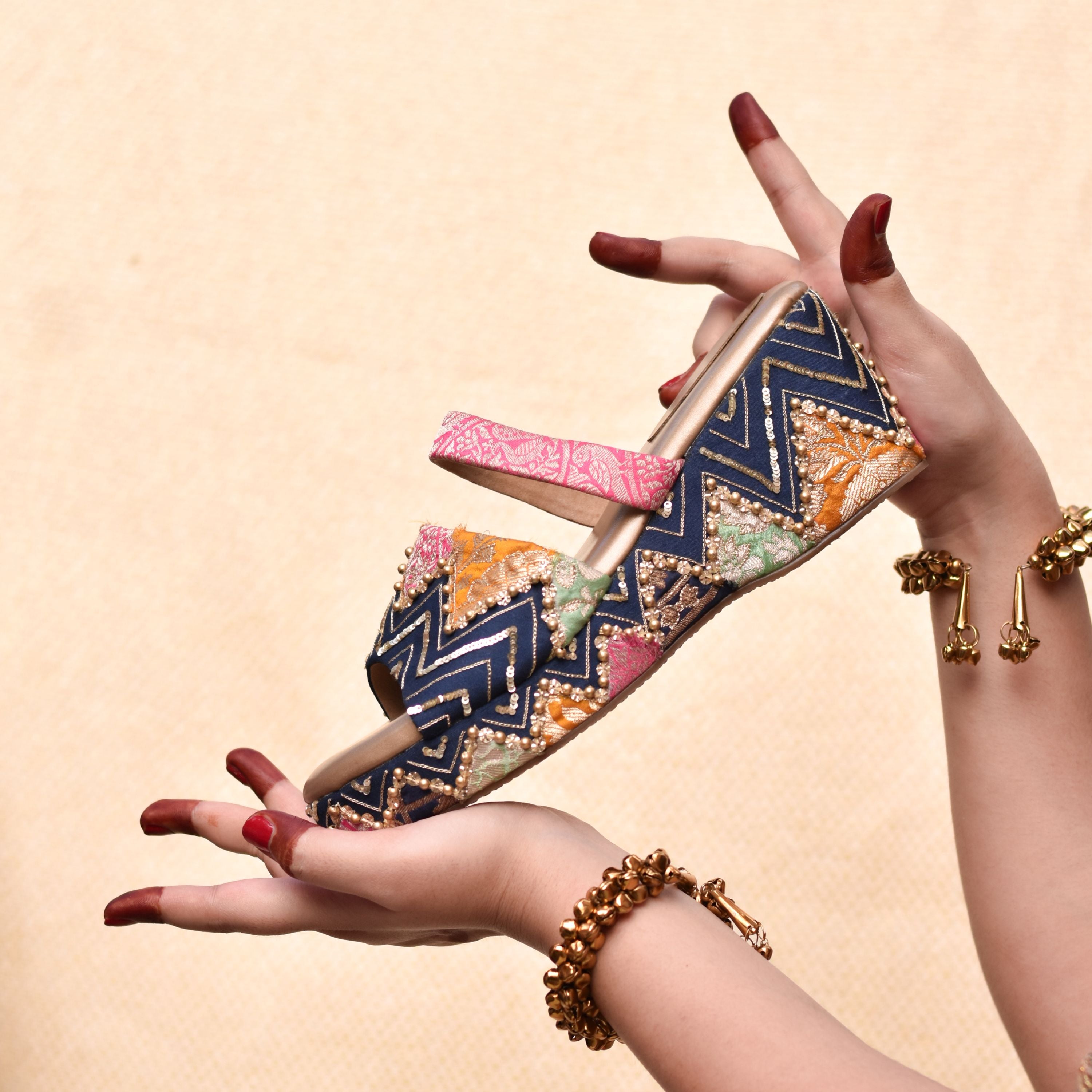 Navy wedge heels with zigzag sequin design and multicolour brocade applique