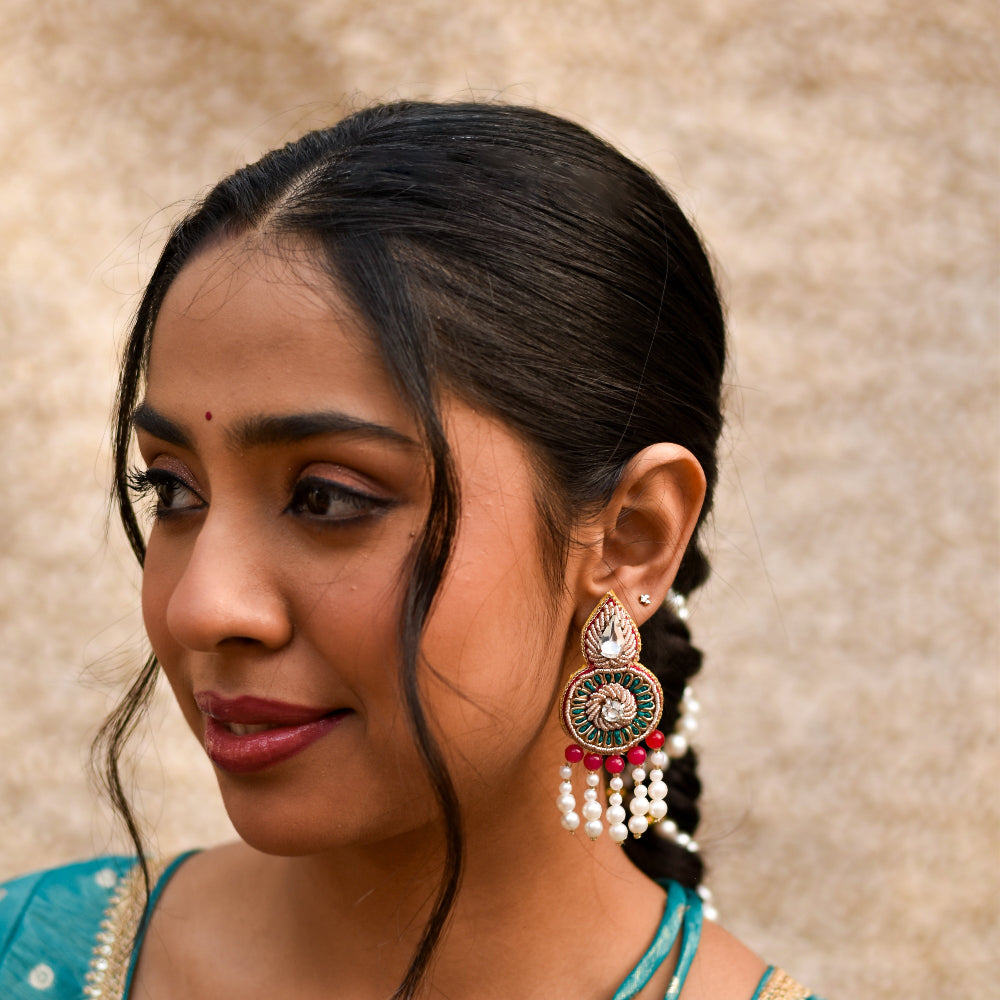 Indian bride wearing trendy handmade earrings for her haldi look