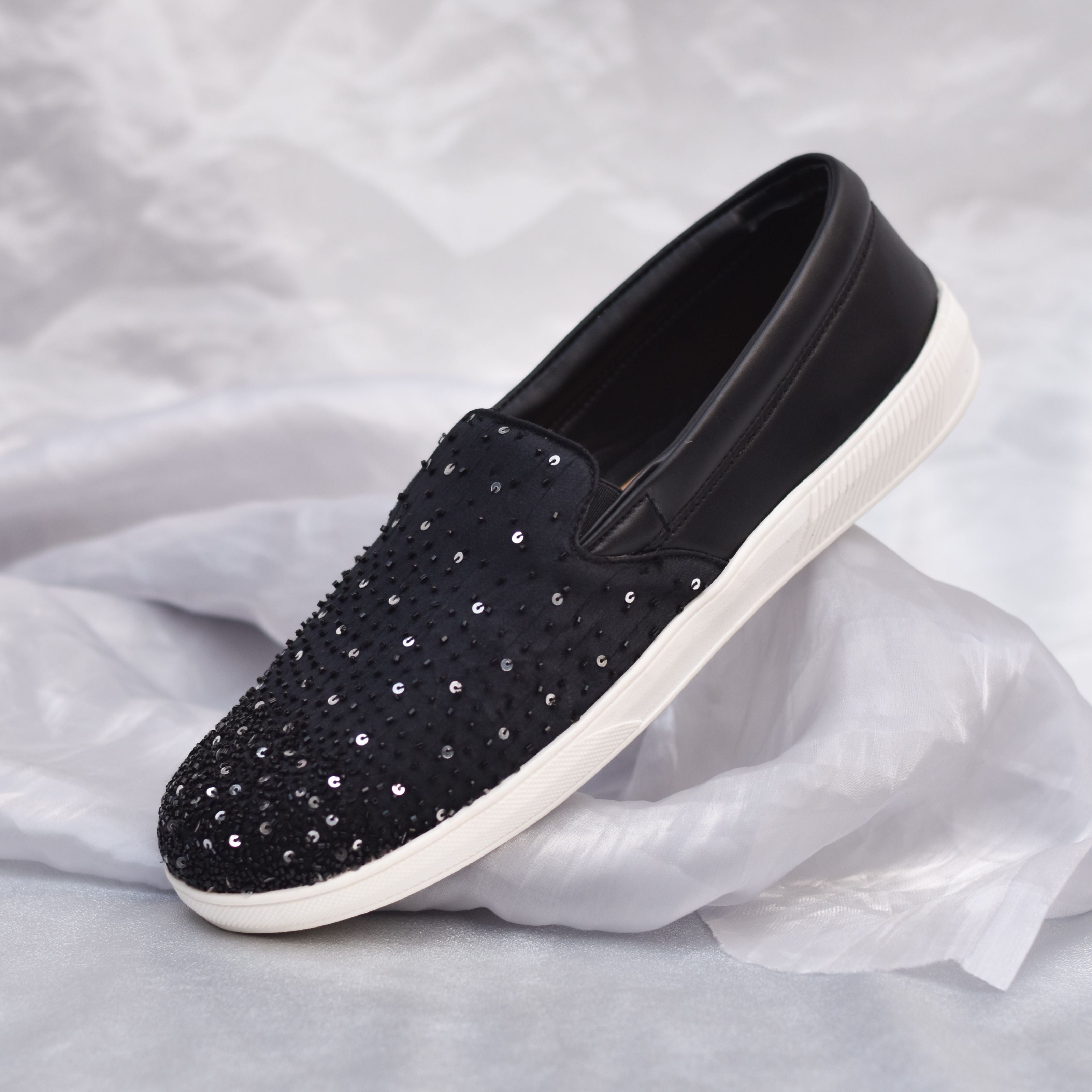 Matte finish footwear with shimmer accents and smooth leather-look texture