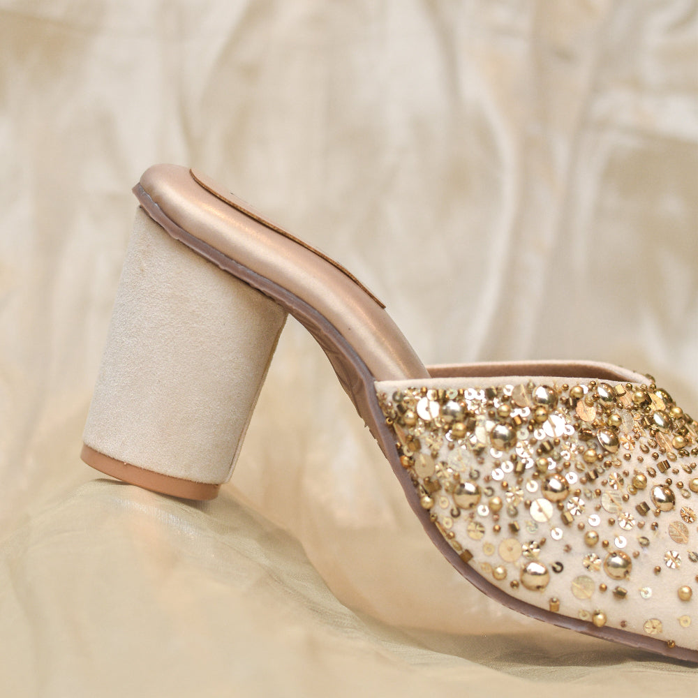 Premium ivory bridal block heels with handcrafted decorative detailing.