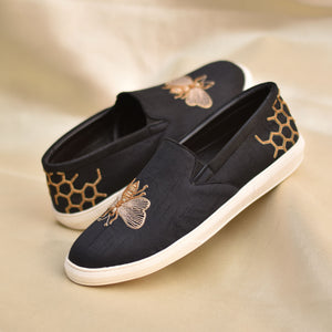 Festive shoes blending playful charm, structured shape, and rich tones.