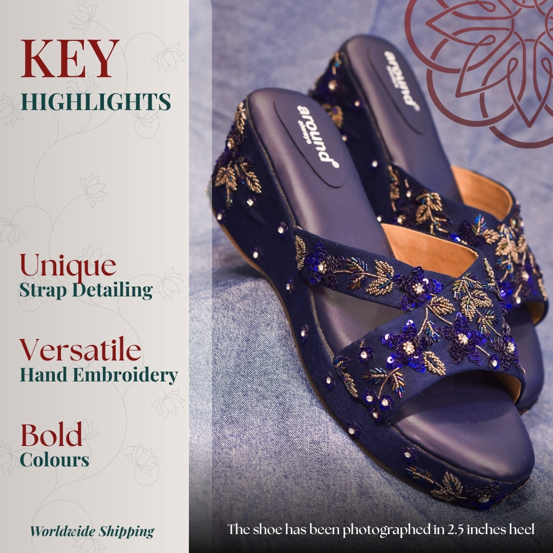 Deep blue wedges with decorative detailing and lightweight construction