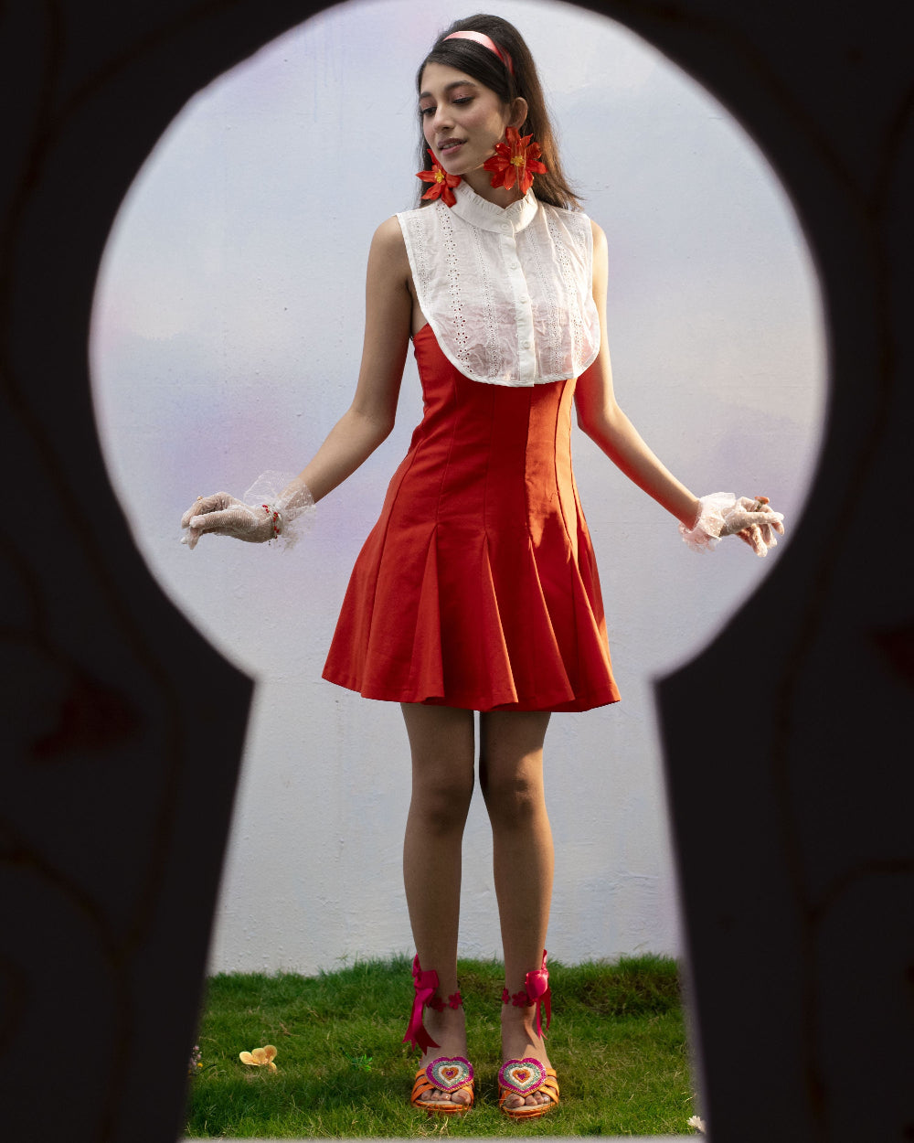 Women in festive flatform footwear with colourful embellishment