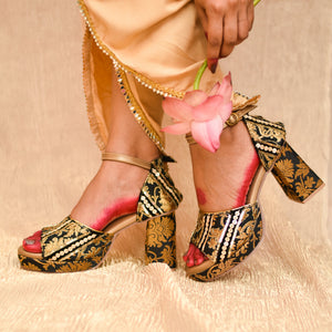 Black and gold block heel with ankle strap and cushioned insole
