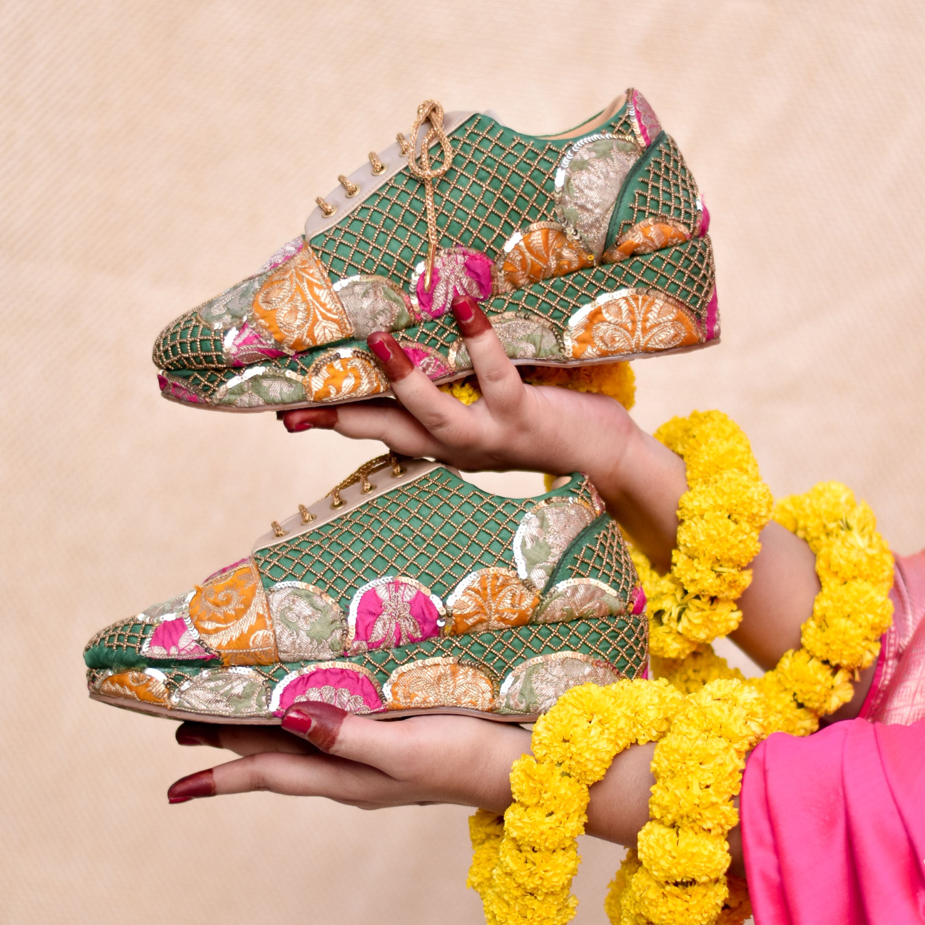Women’s festive sneaker in green base with pink and mustard brocade