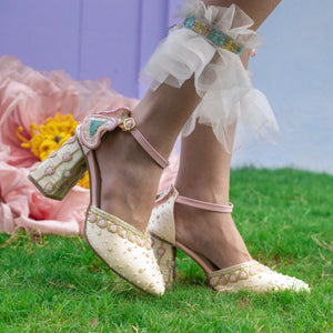 Statement heels with beadwork and patel colour details