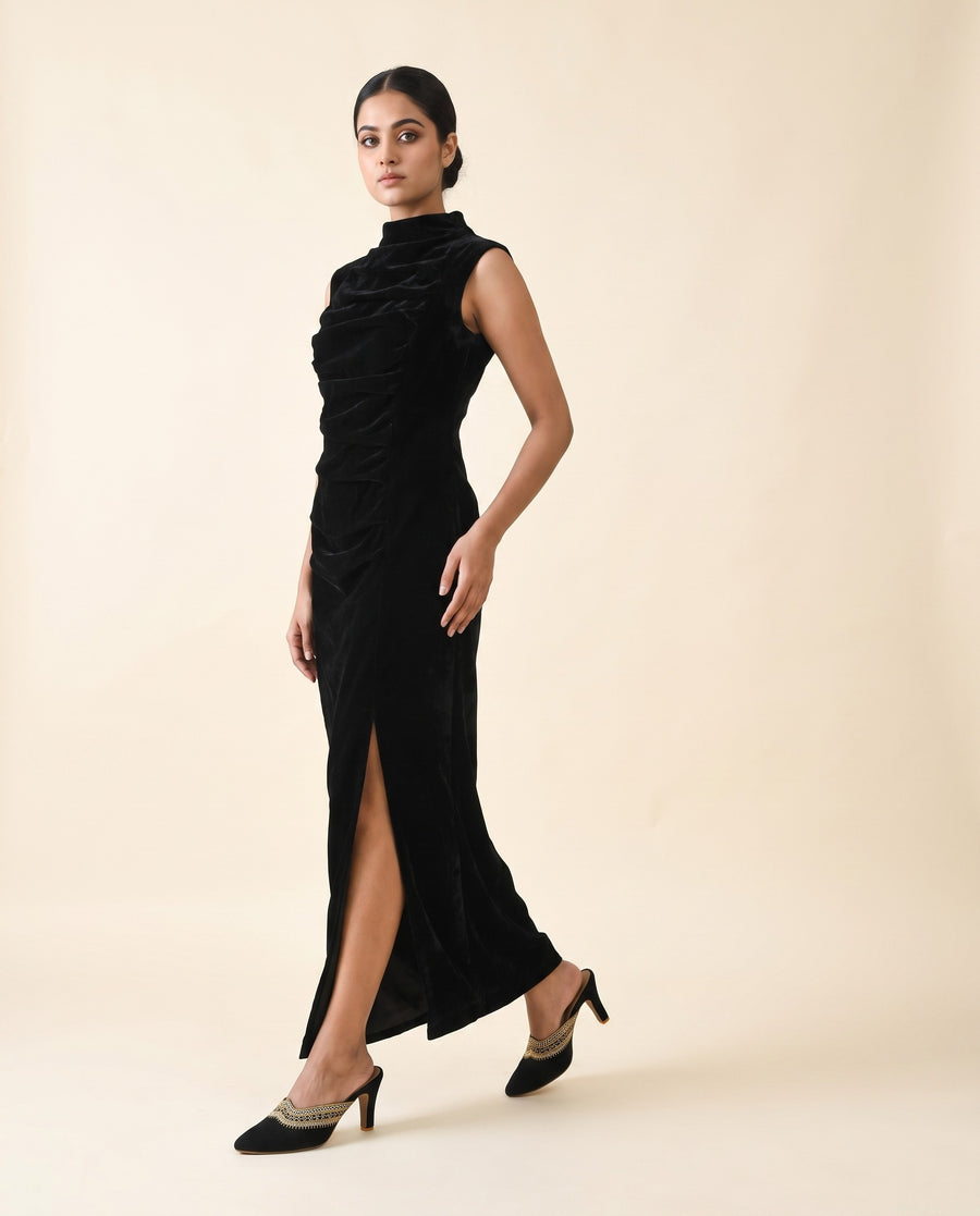 A black cocktail gown paired with designer black mules with high heels from Around Always