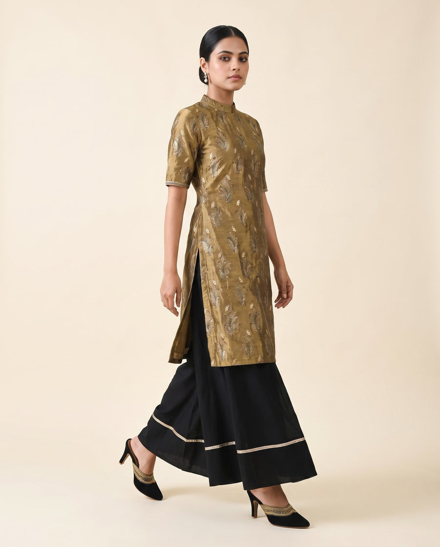 Black suede mules with designer zardozi detailing for a classy Indian brocade outfit with pants