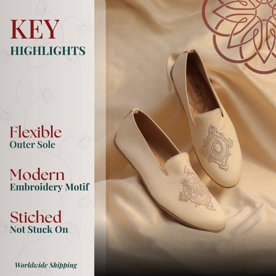 Classic beige loafer with ornate motif