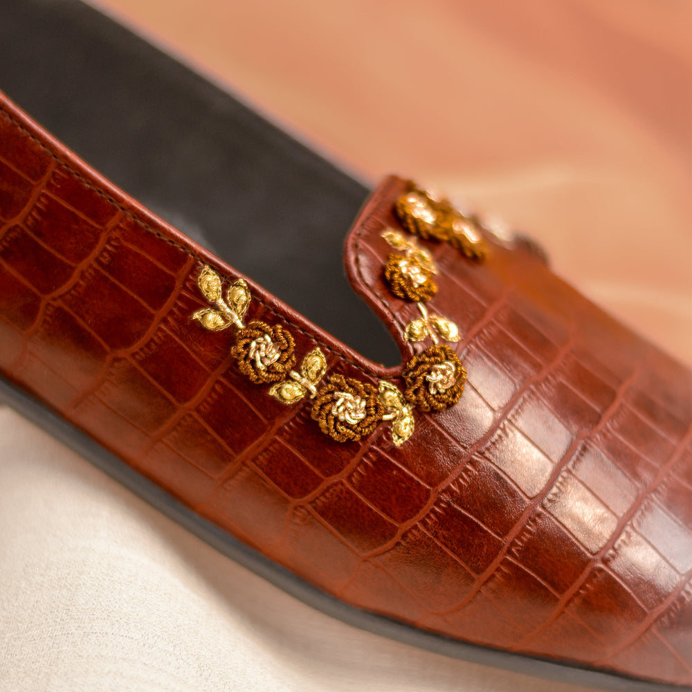 Brown croc-embossed loafer with gold floral embroidery 