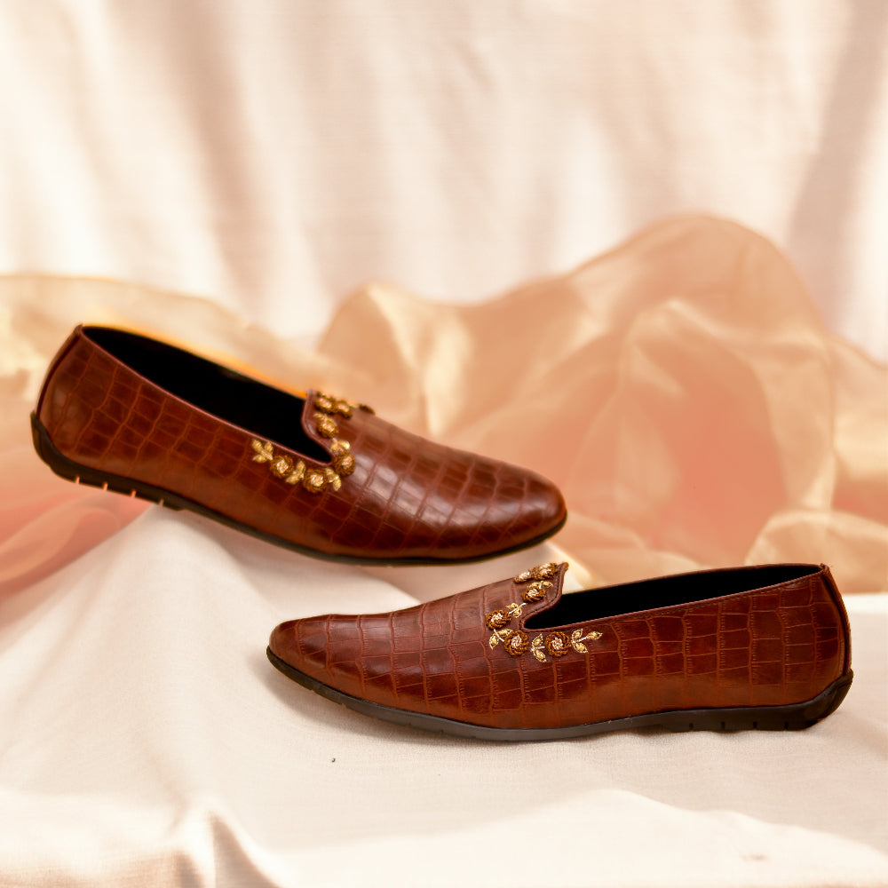 Brown crocodile textured loafer with metallic bel motif detailing