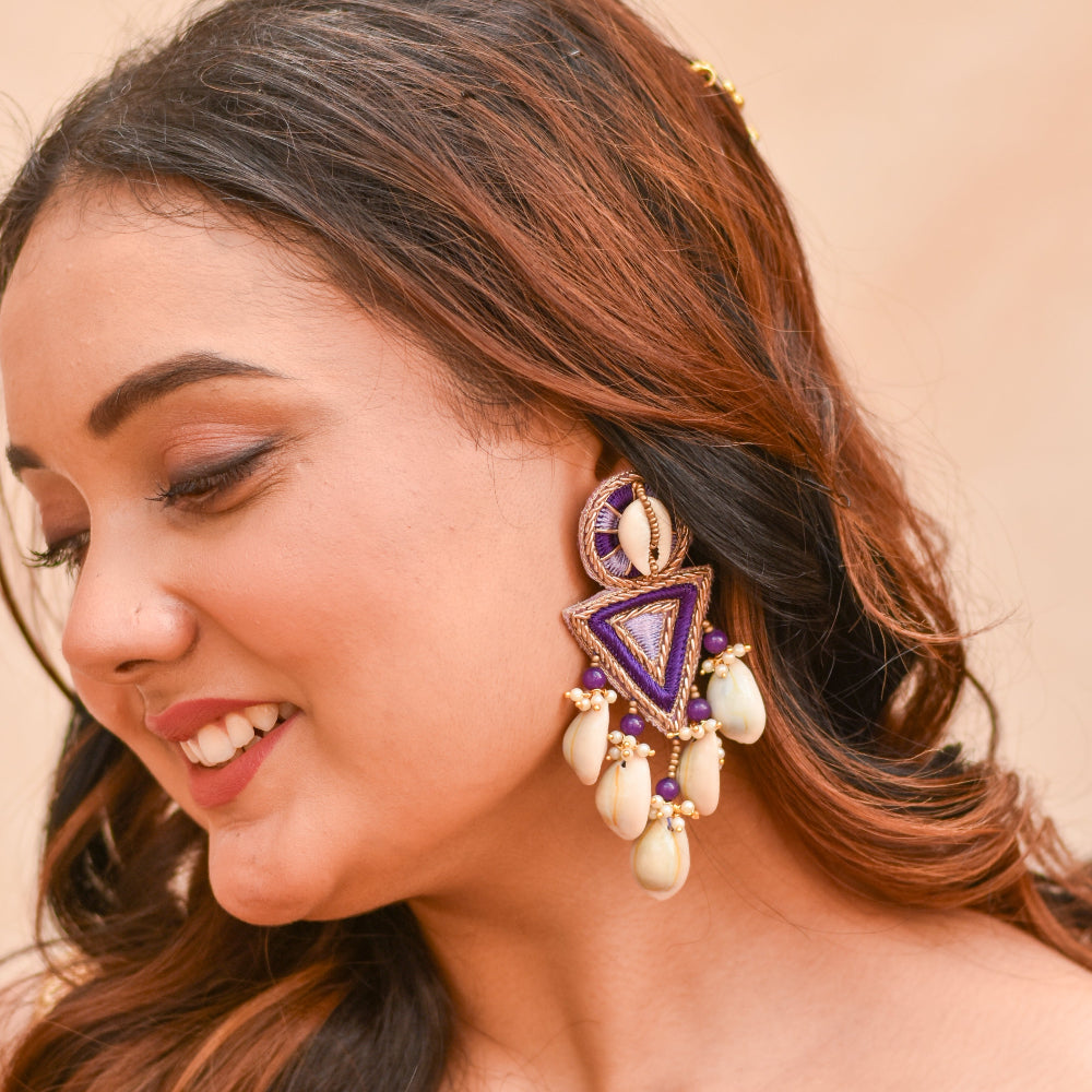 Woman wearing a decorative imitation earring for haldi ceremony