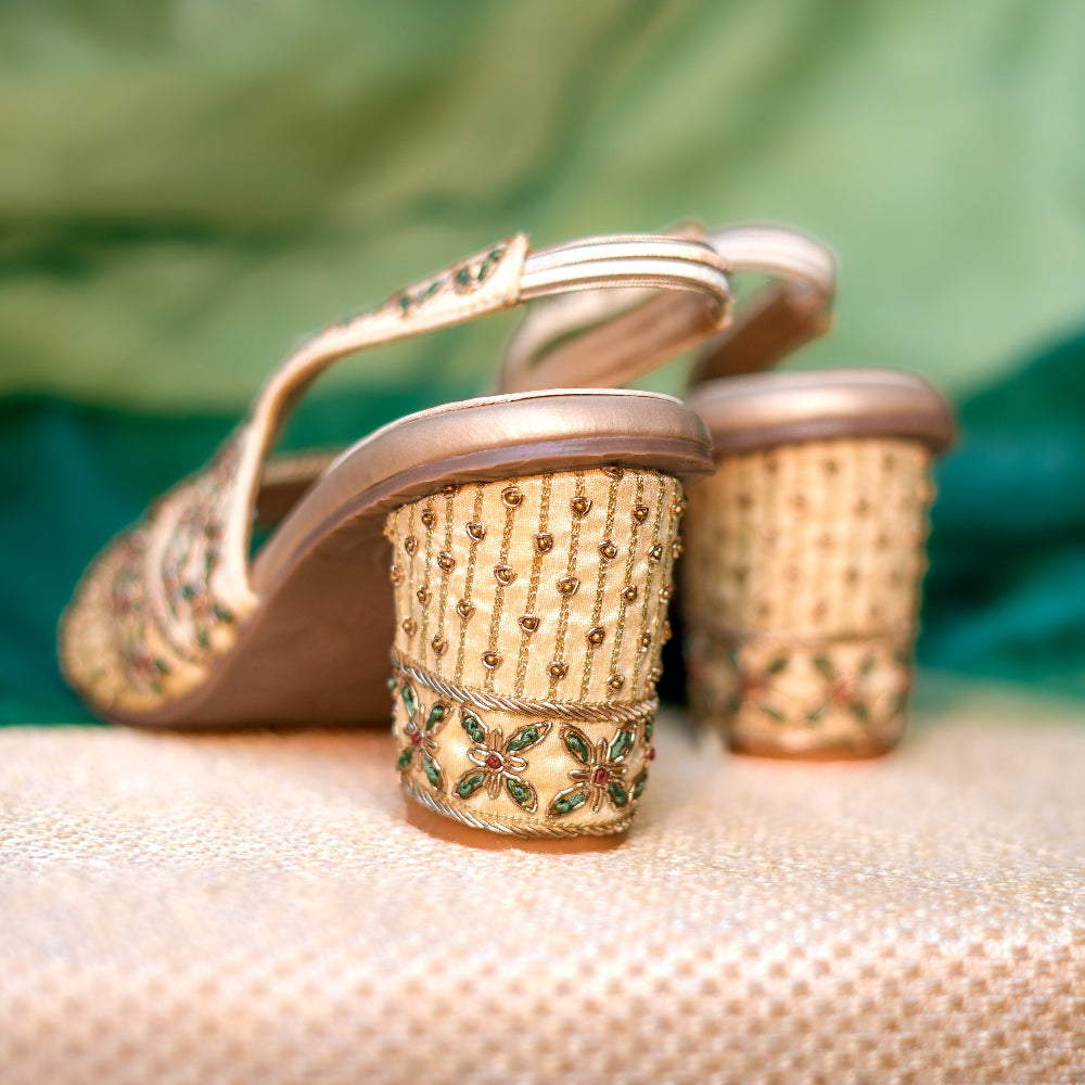 Cushioned heeled sandals with green and red floral motifs
