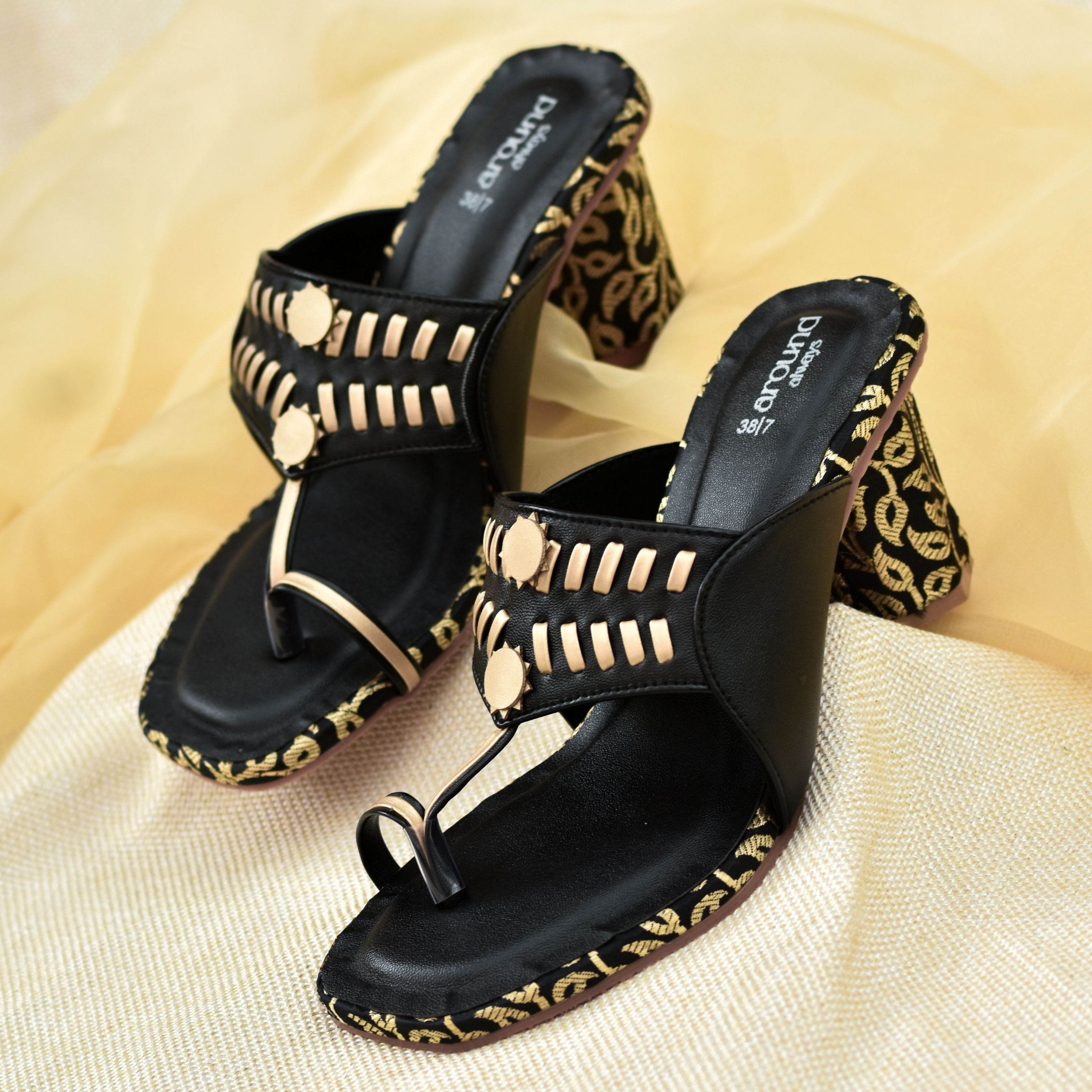 Black toe-loop footwear with faux leather straps and comfy insole.