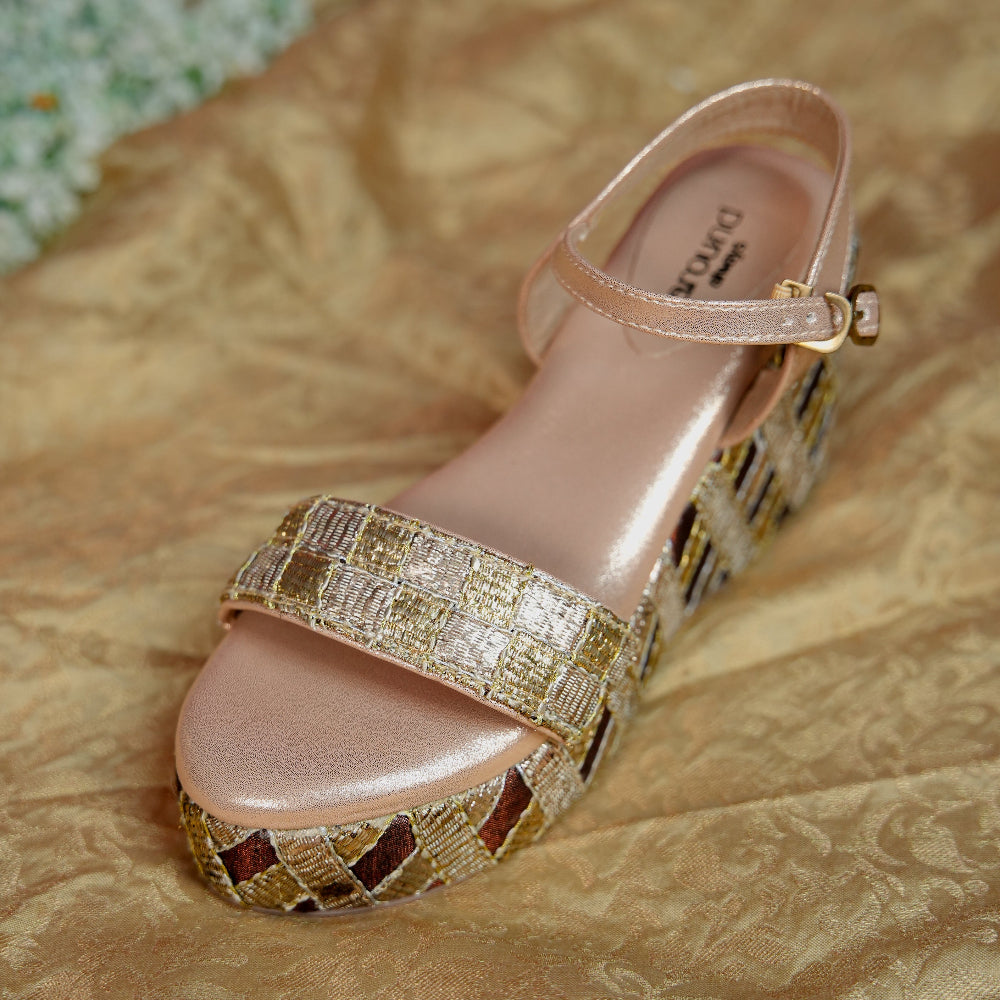 Gold woven platform heel with champagne ankle strap and buckle
