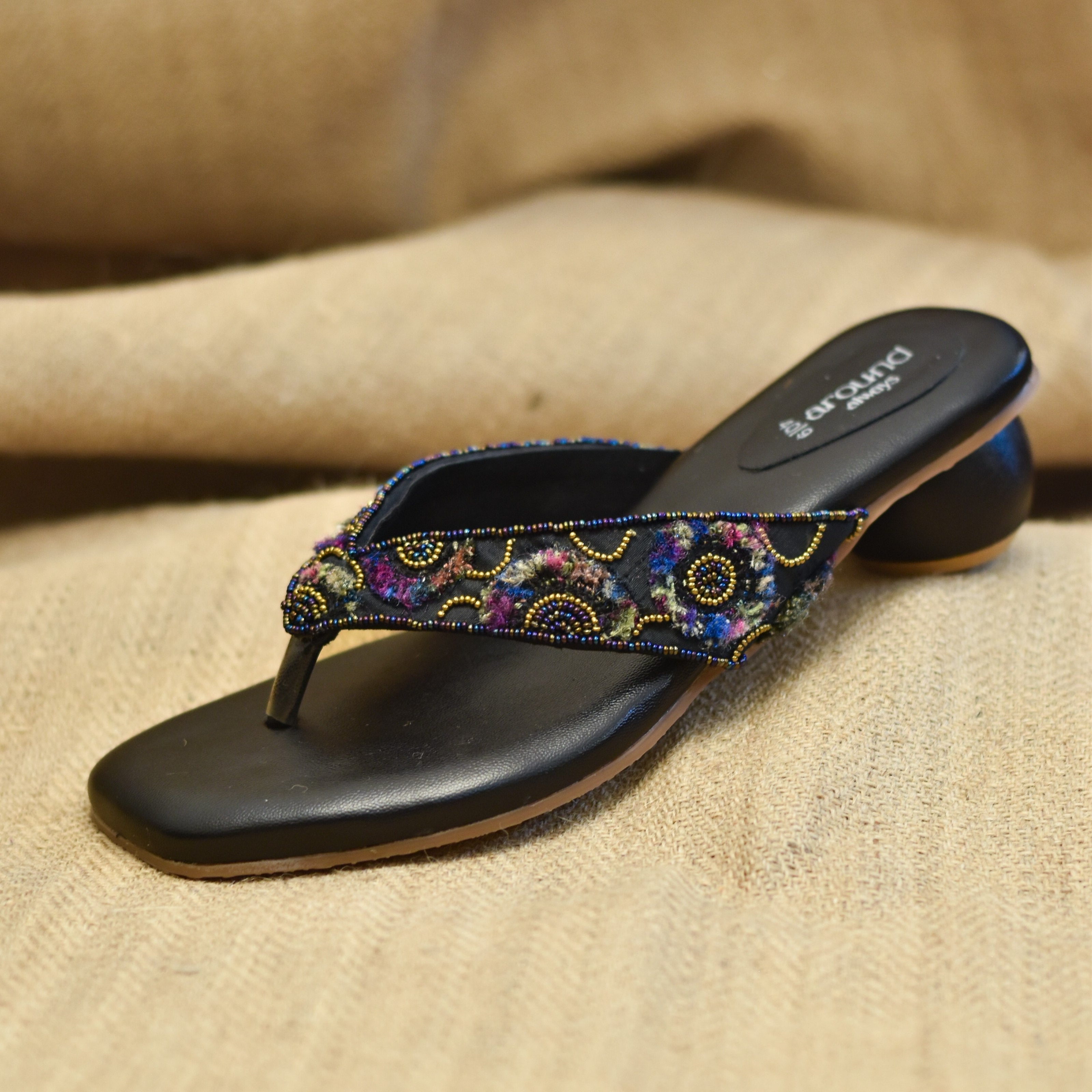 Black casual sandals for women with multicoloured yarn and bead accents