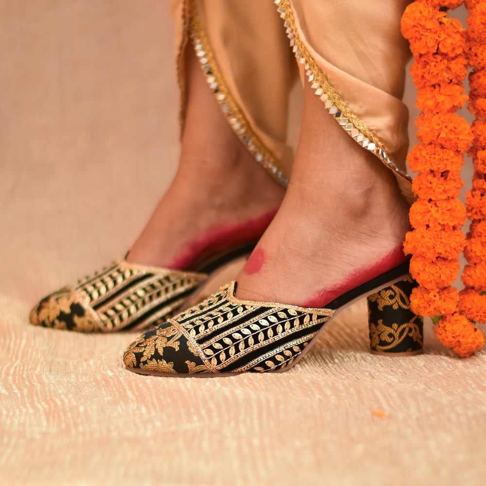 Black block heel with gold vine pattern and closed toe