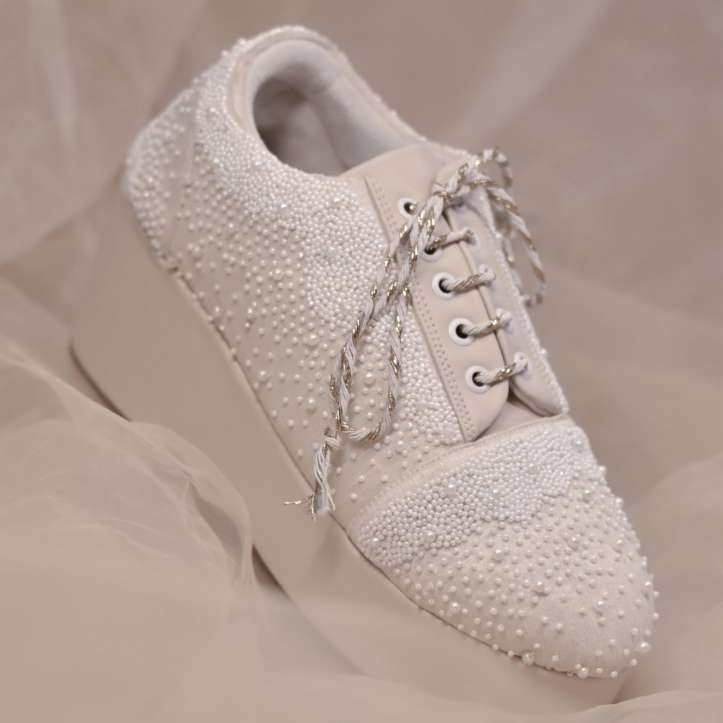 Lace up white sneakers for weddings