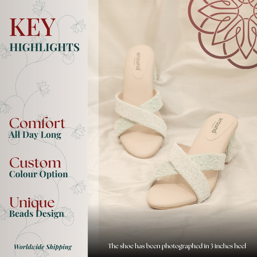 Mint green beaded cross strap block heeled mules with soft cushioned base