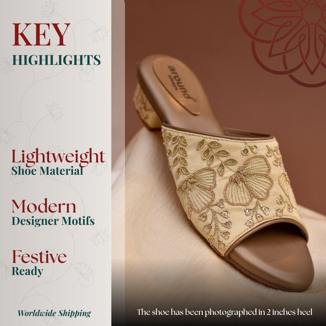 Beige sandal with golden intricate traditional detailing