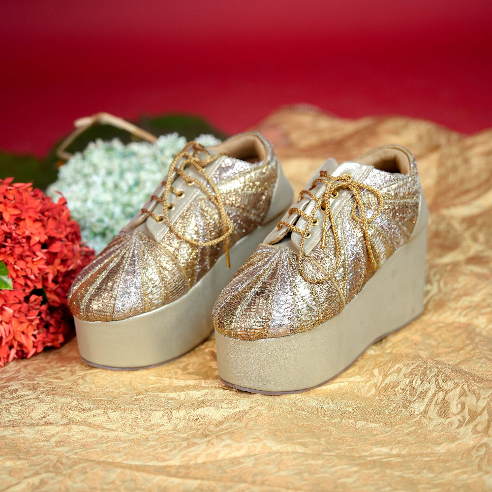 Champagne sneaker wedge with gold and silver metallic textile detailing
