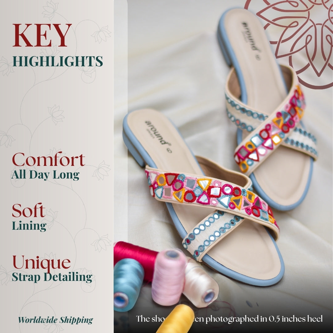 Pastel cross strap flats with vibrant geometric threadwork