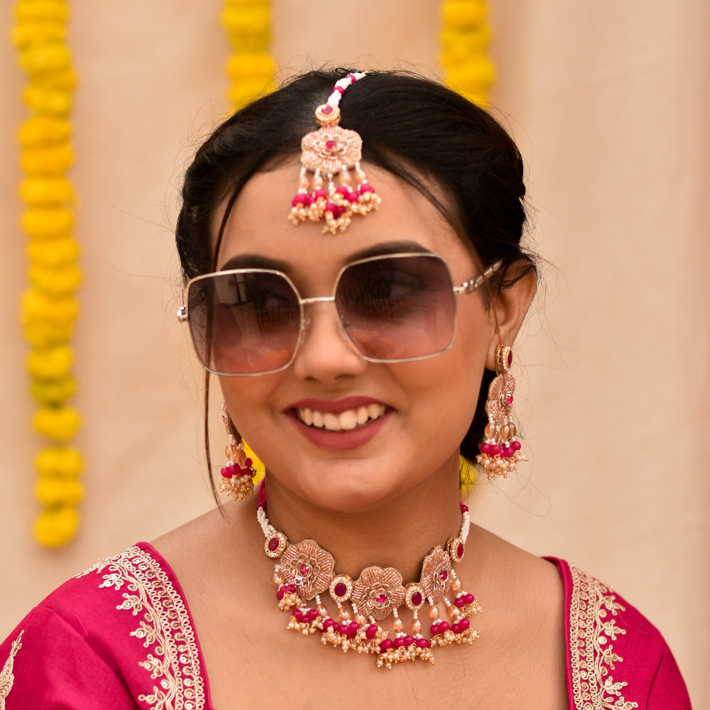 Sassy bride wearing handmade jewellery set for her haldi celebration
