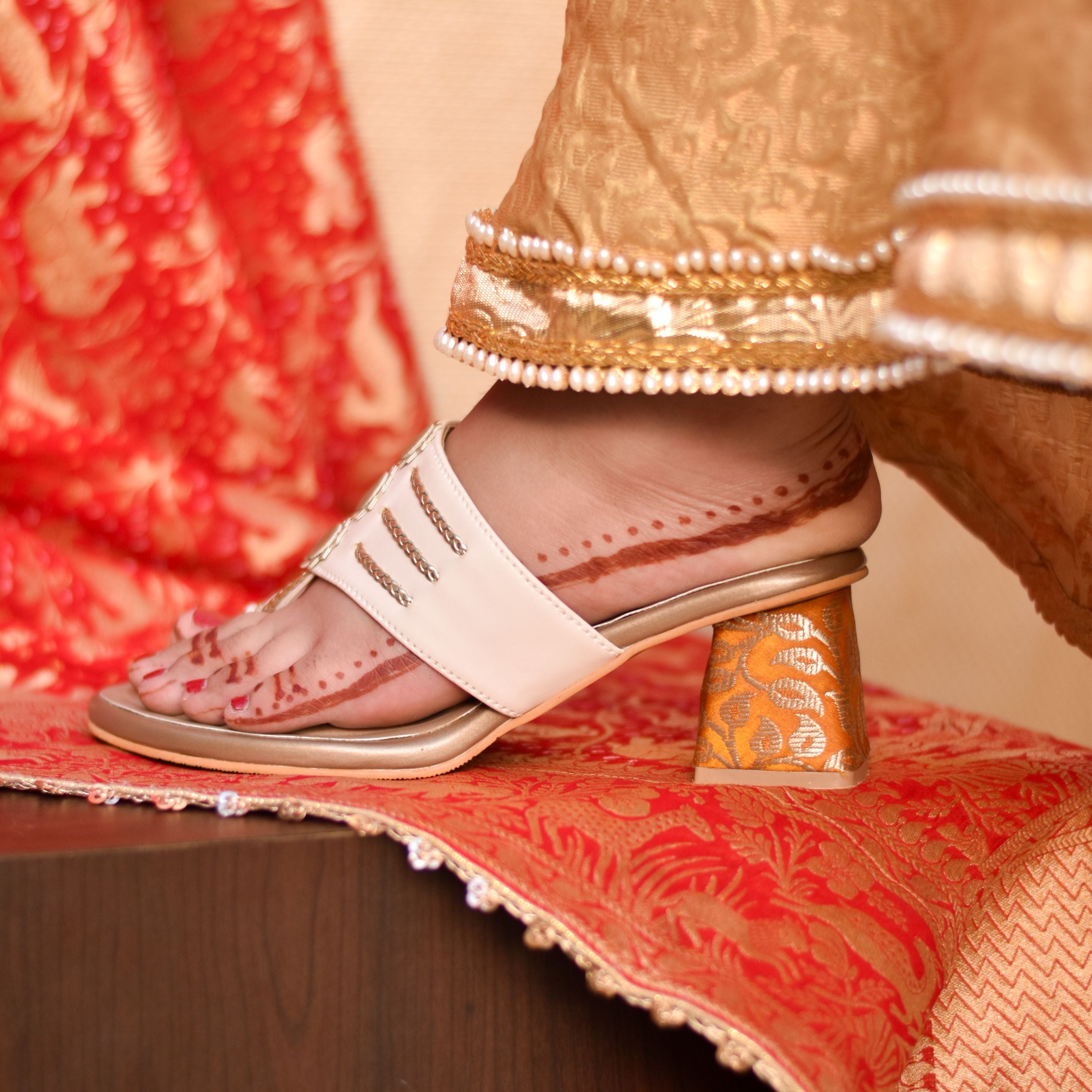 Festive women’s slip-on sandals with ivory straps and yellow block heels