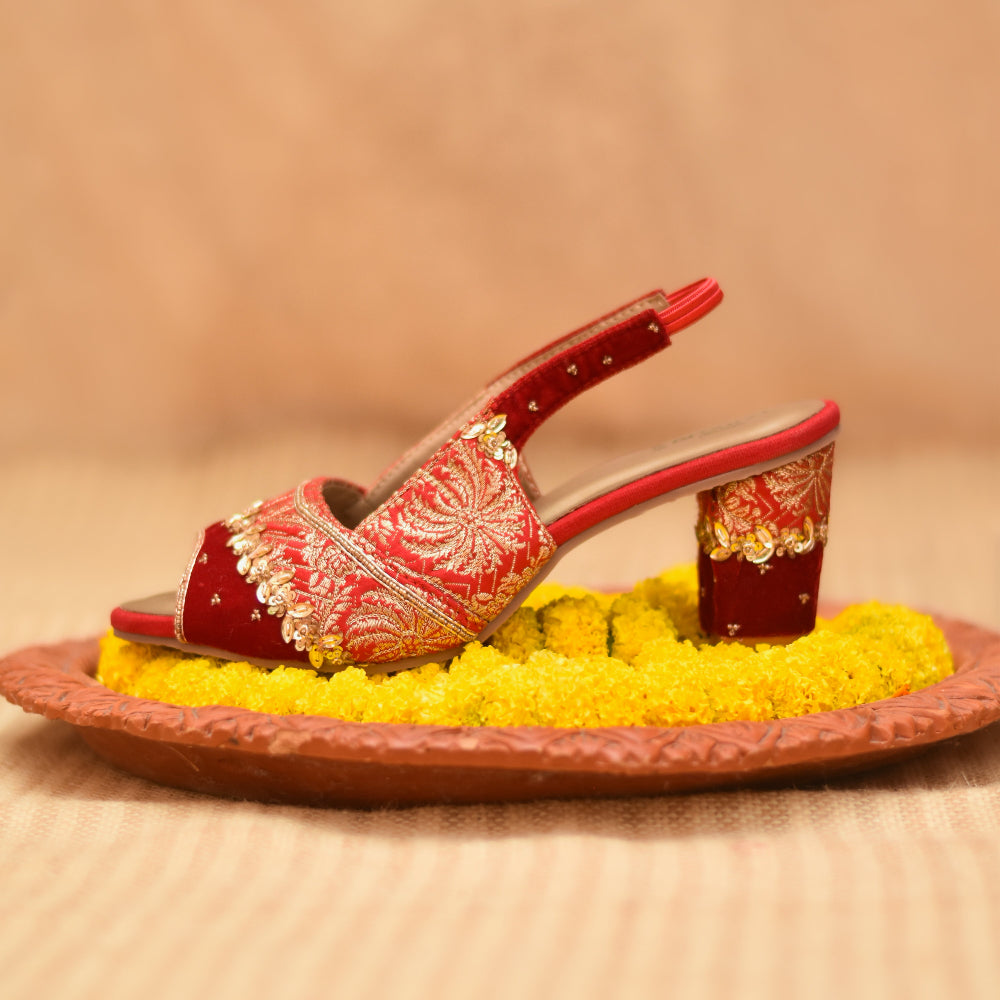 Women’s occasion footwear with slingback strap and embroidered upper
