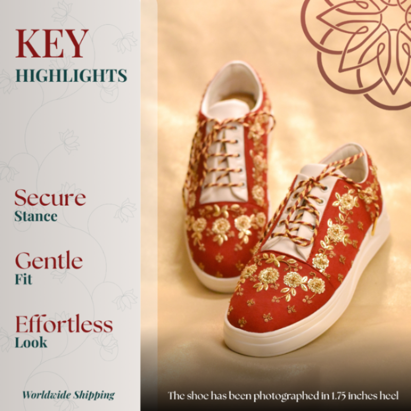 Red floral embroidered wedge sneakers with gold detail, lace up detail, and cushioned white sole