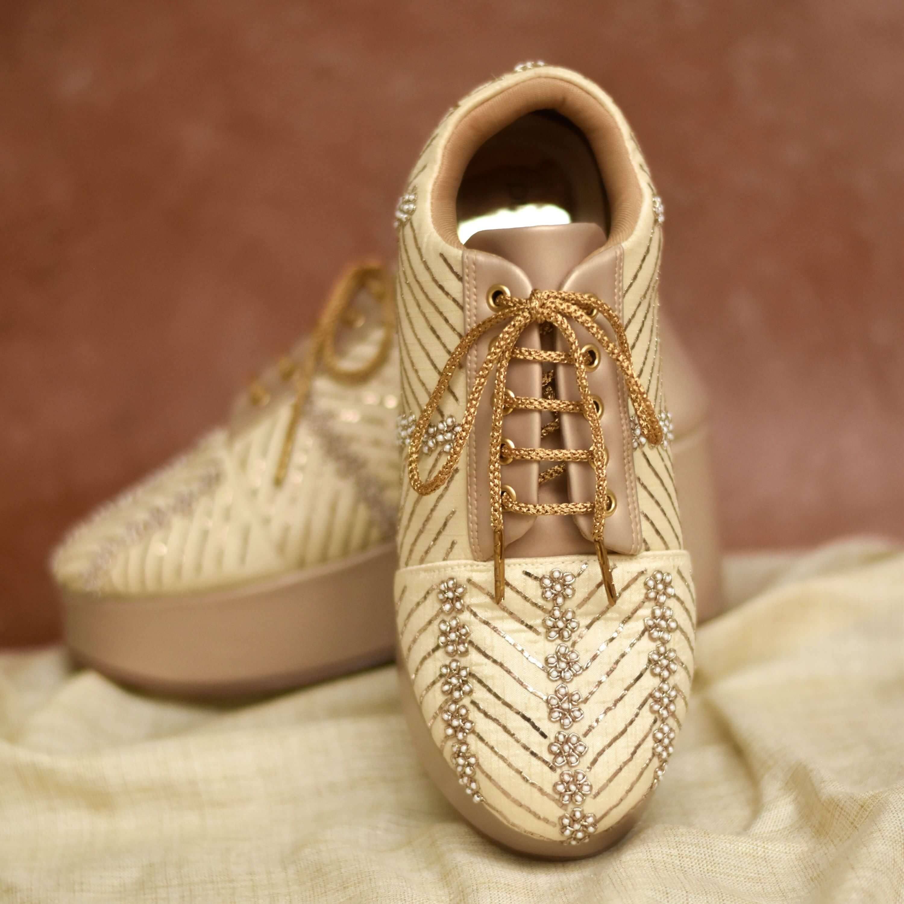 Metallic striped heels with nude platform sole for long wear comfort