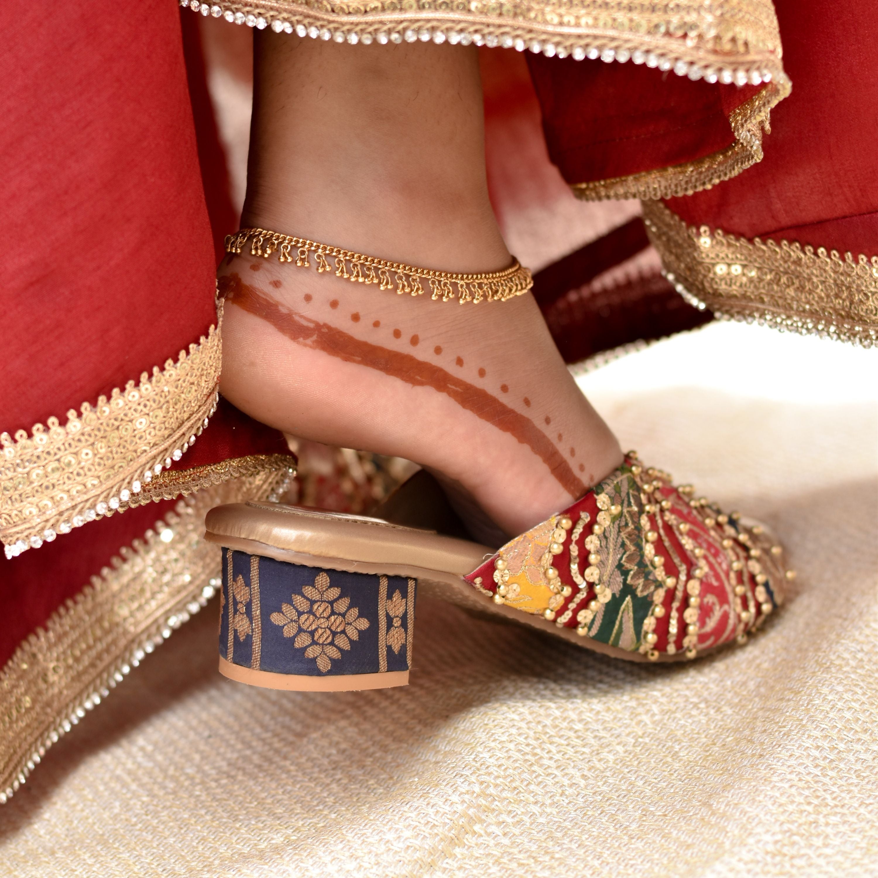 Traditional Indian block heels with red, gold, ochre blue and navy brocade