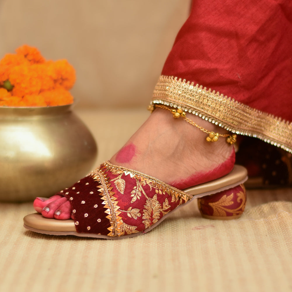 Traditional inspired sandal with rich fabric and subtle embellishments