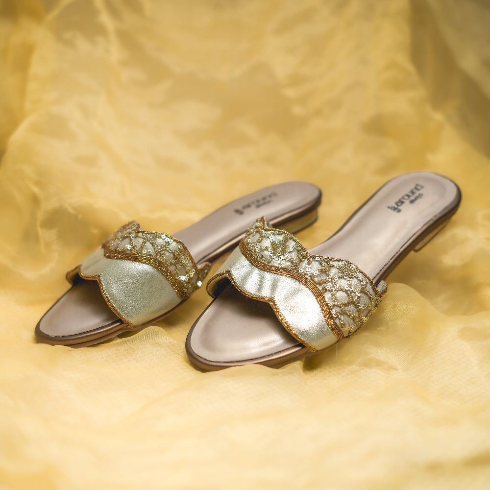 Gold embellished flats wih low heel and cushioned footbed