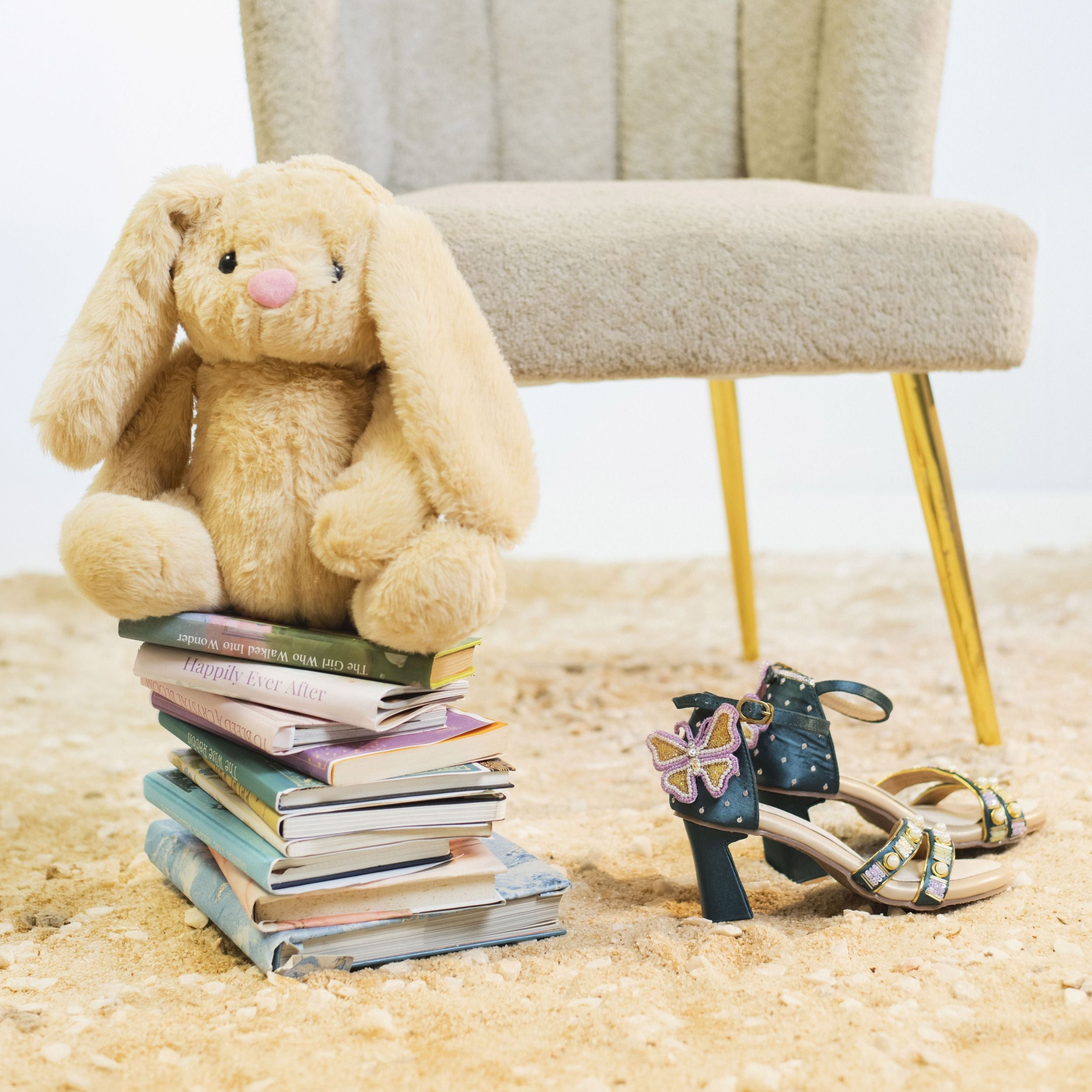 Teal heeled footwear with embroidered straps and cushioned base