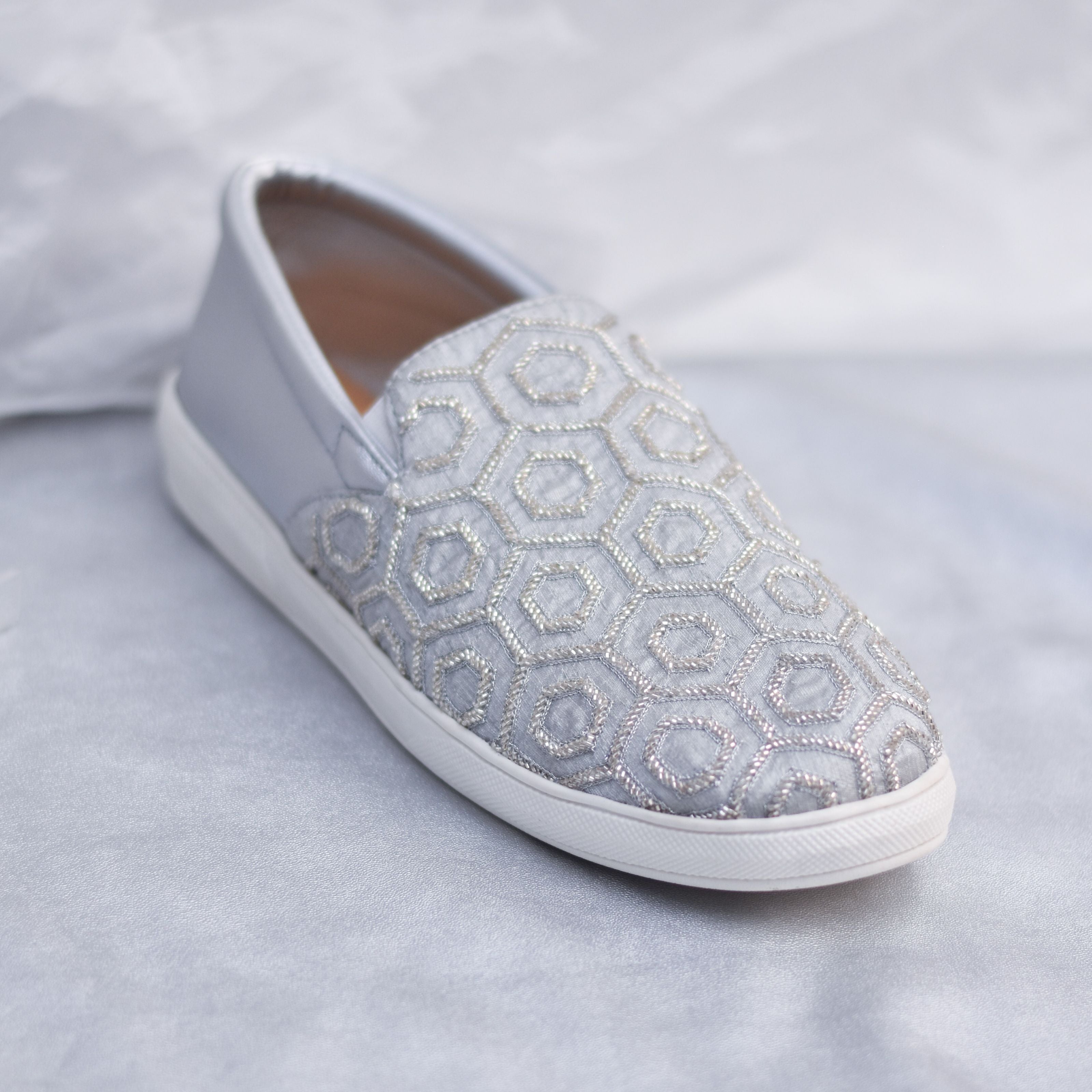 Embellished groom sneakers in grey and silver tones featuring honeycomb textures.