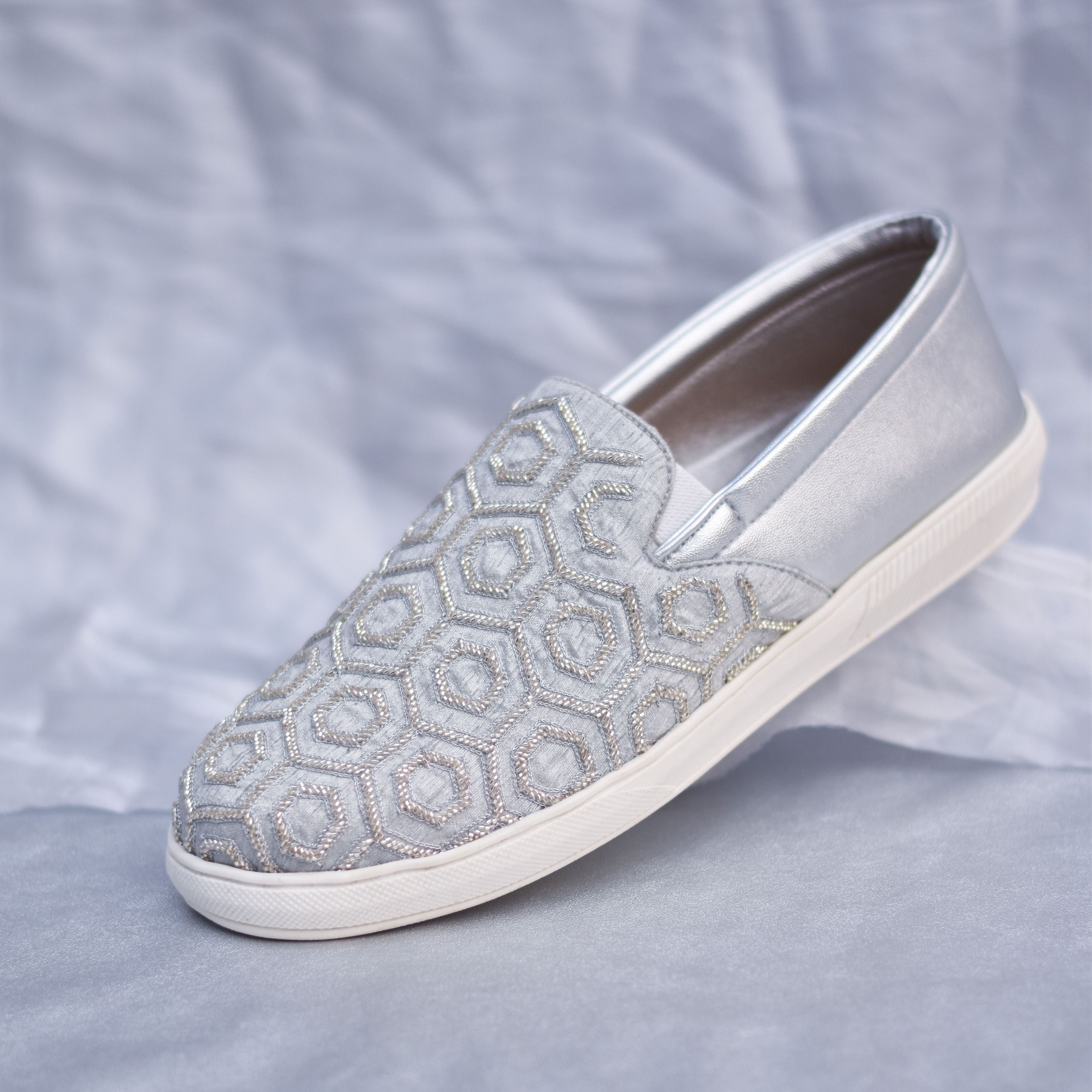 Designer men's occasion wear shoes in pastel silver with embroidered surface work.