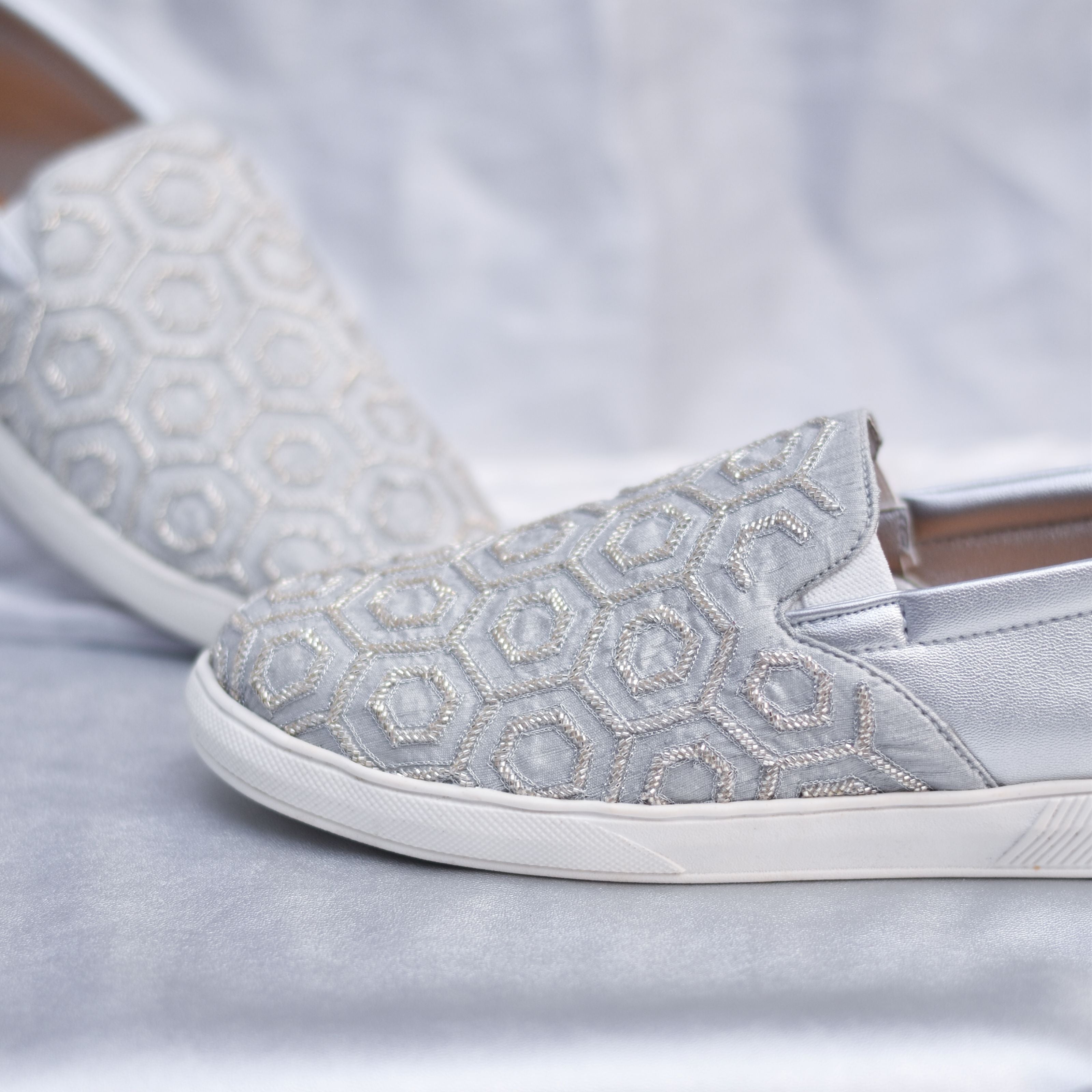 Contemporary groom footwear in grey and silver with hexagon beaded pattern and white sole.