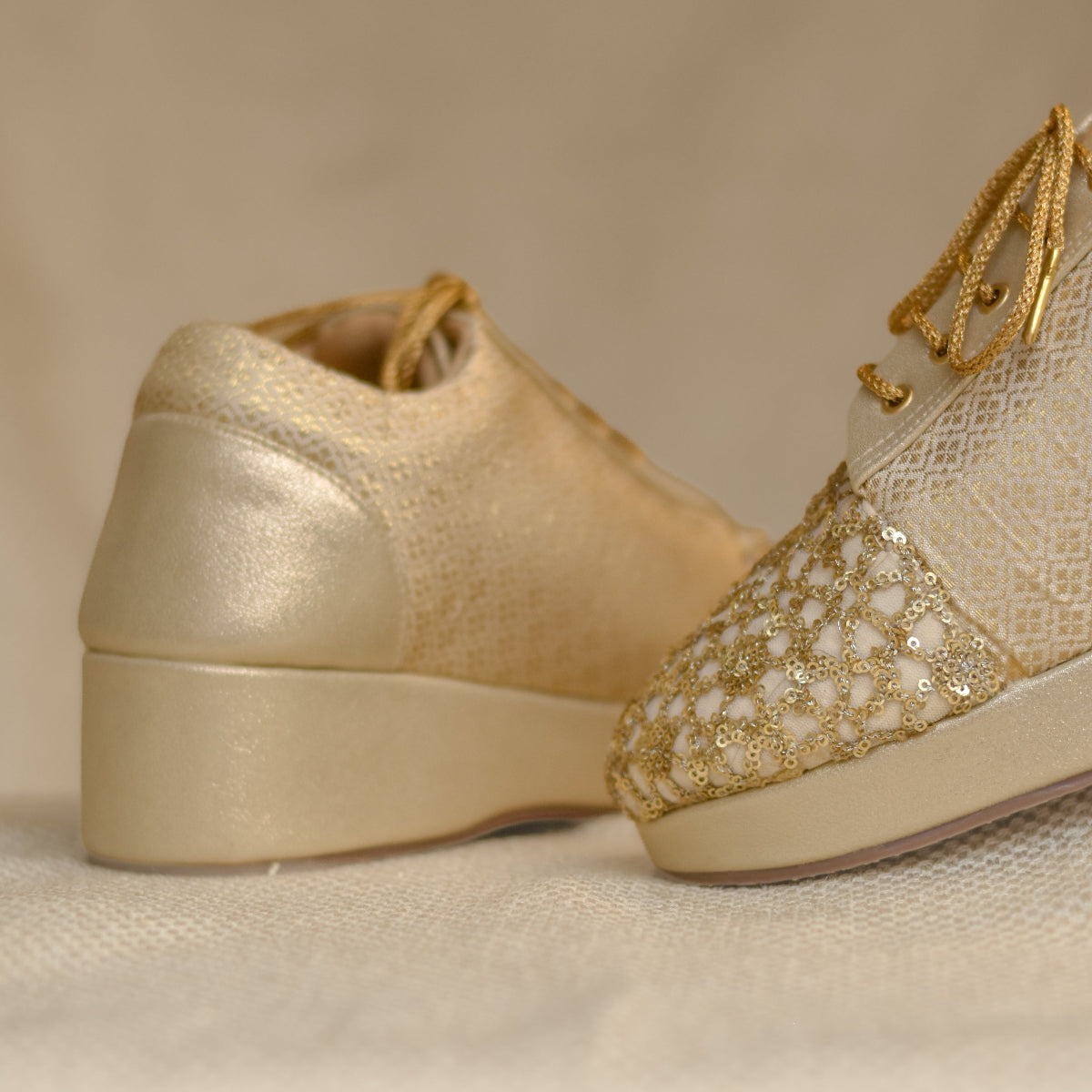 Minimal golden sneaker wedges in an affordable range for brides and their mother