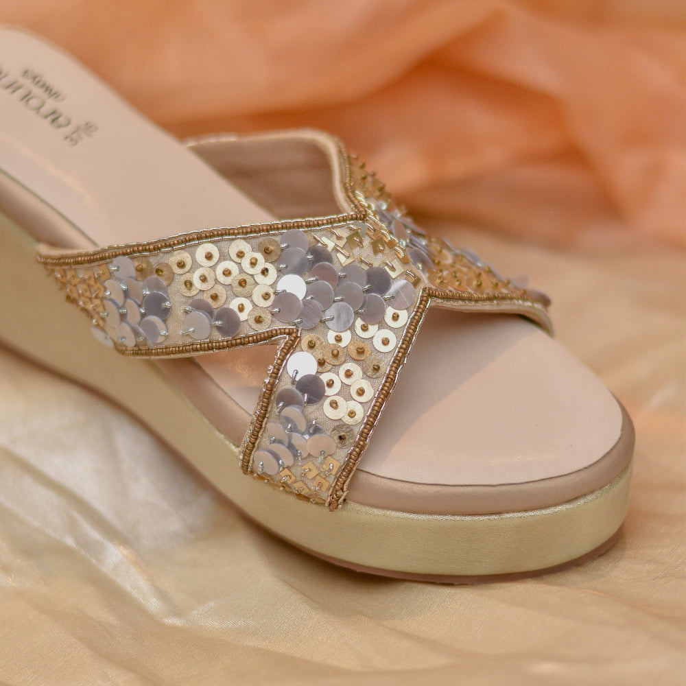 Premium ivory occasion wedges with embellished crossover straps.