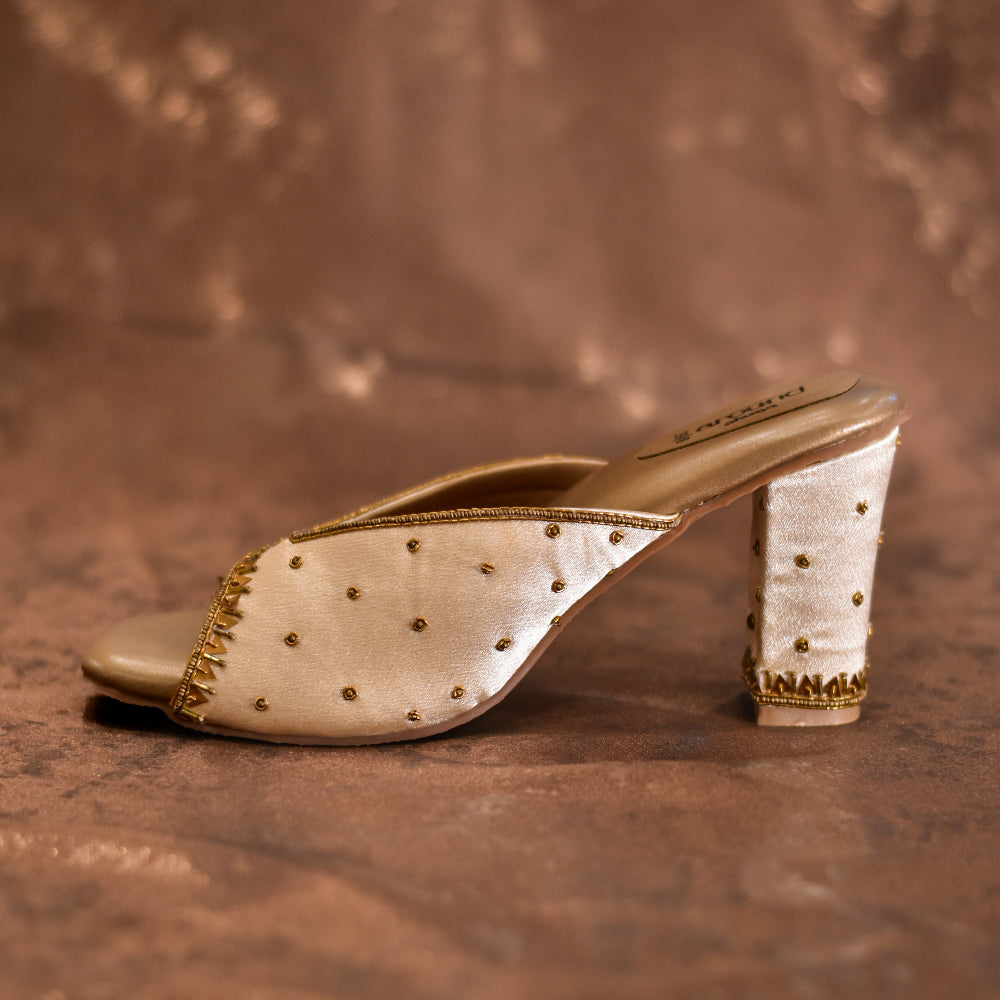 Festive golden heels with cushioned footbed