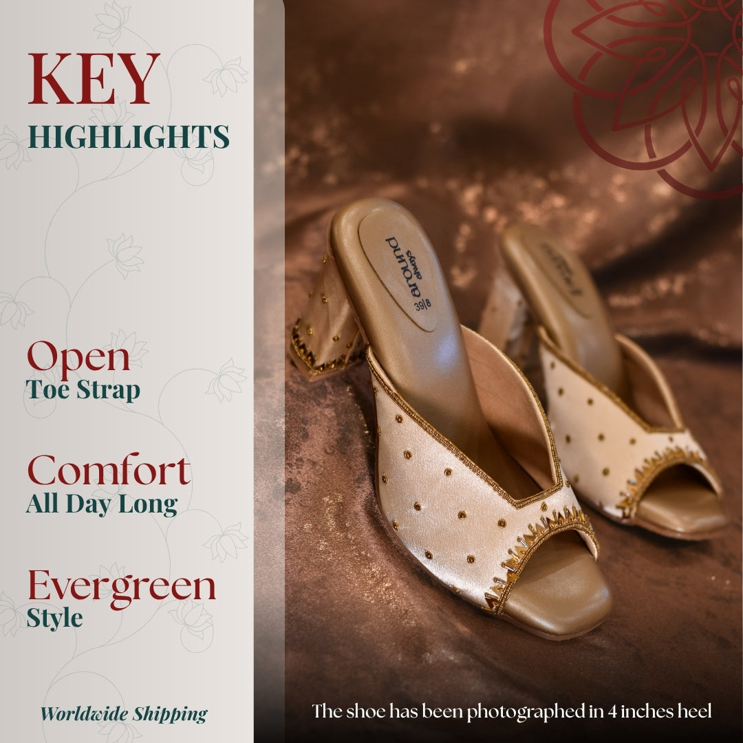 Gold open toe block heel mules with delicate stud embellishments, scalloped edge detailing