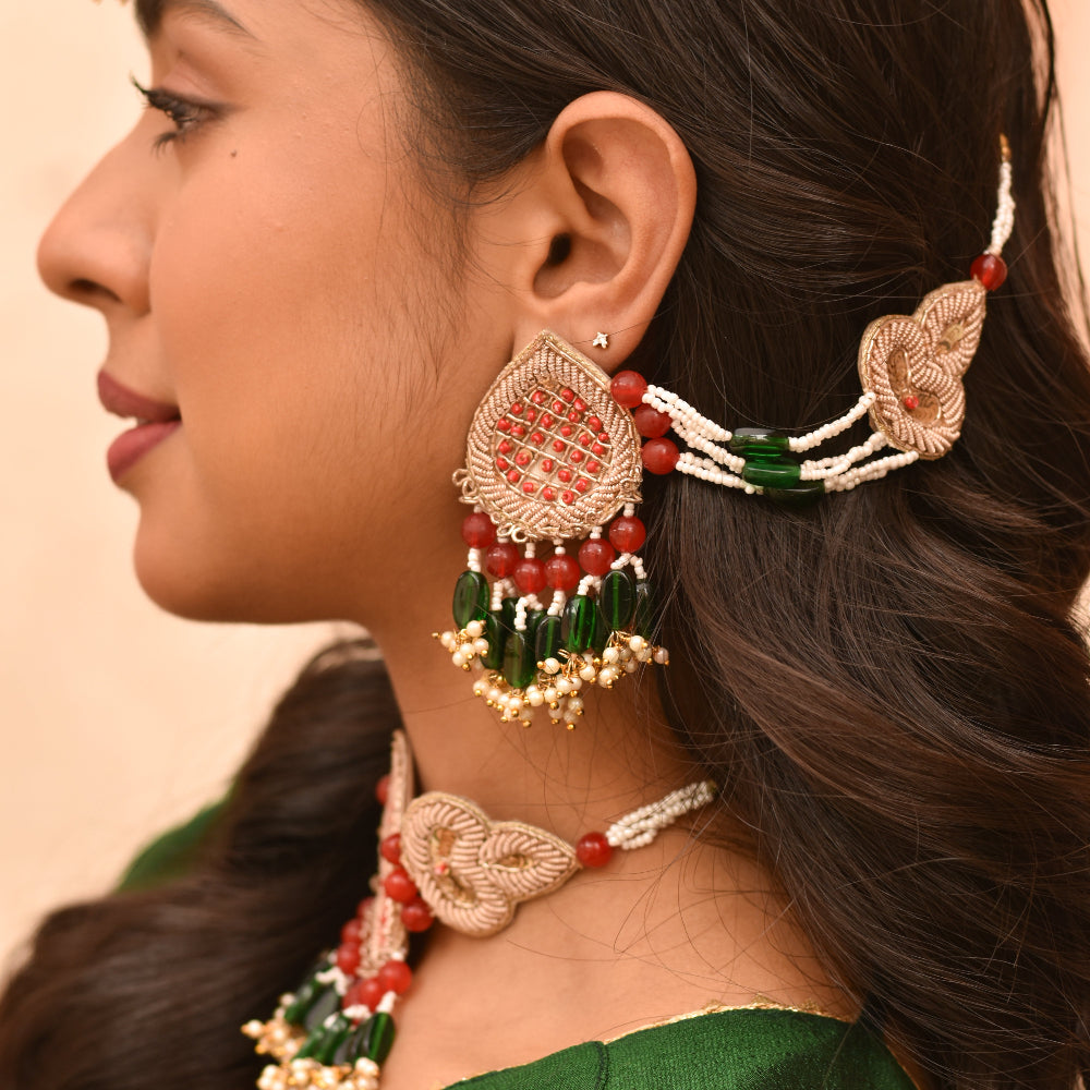 Traditional mehendi jewellery styled with earrings and earchain