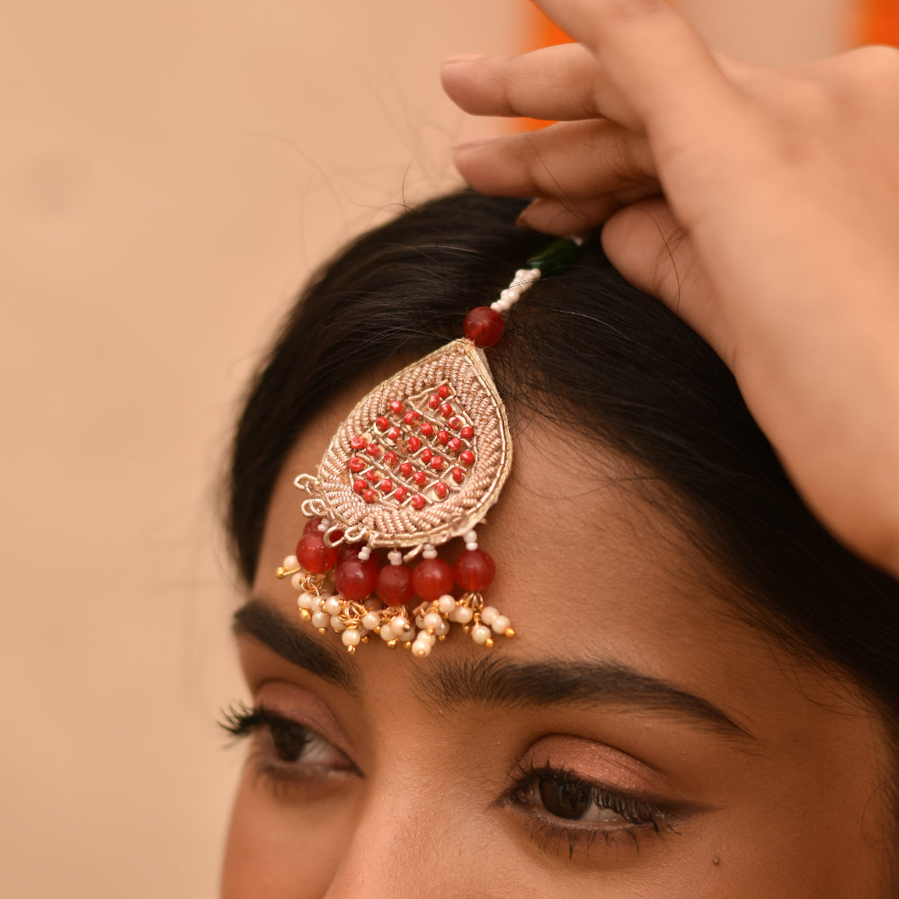 Wedding function jewellery set with bold ethnic maang tikka