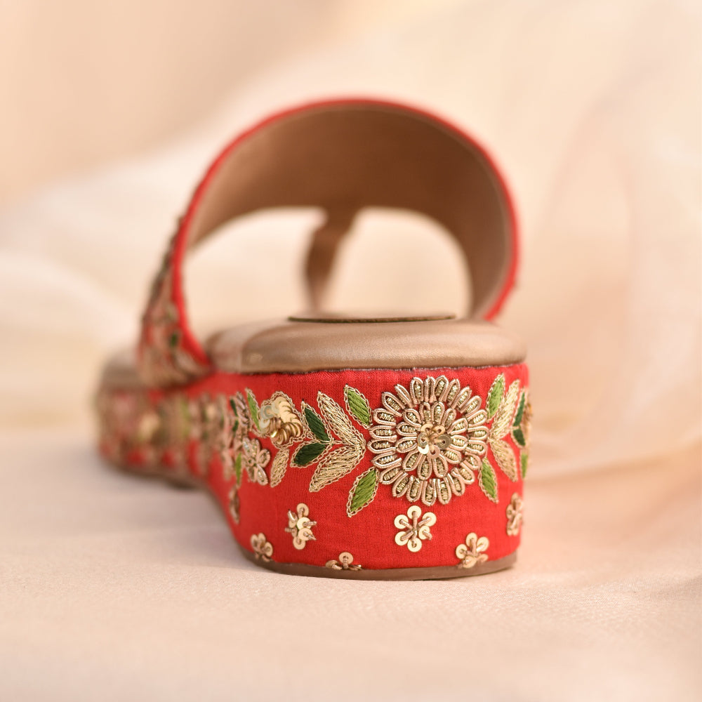 Hand-emboidery embellishment on red bridal heels in kolhapuri style strap
