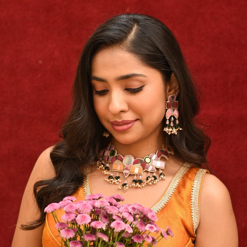 Indian ethnic bride wearing multicolour handmade earring and neckpiece for wedding look