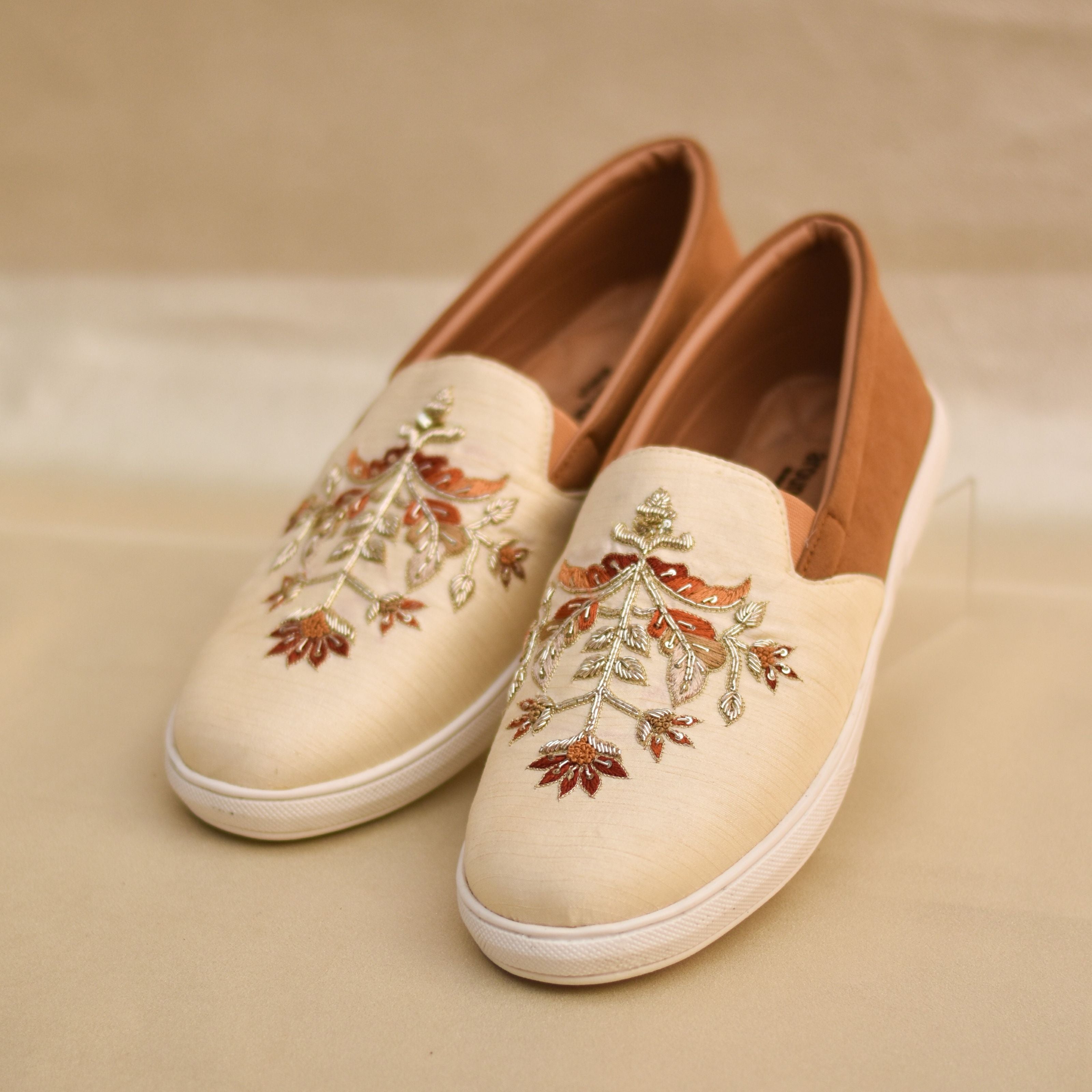Traditional-meets-modern men's wedding shoes with white sole and embroidered upper.