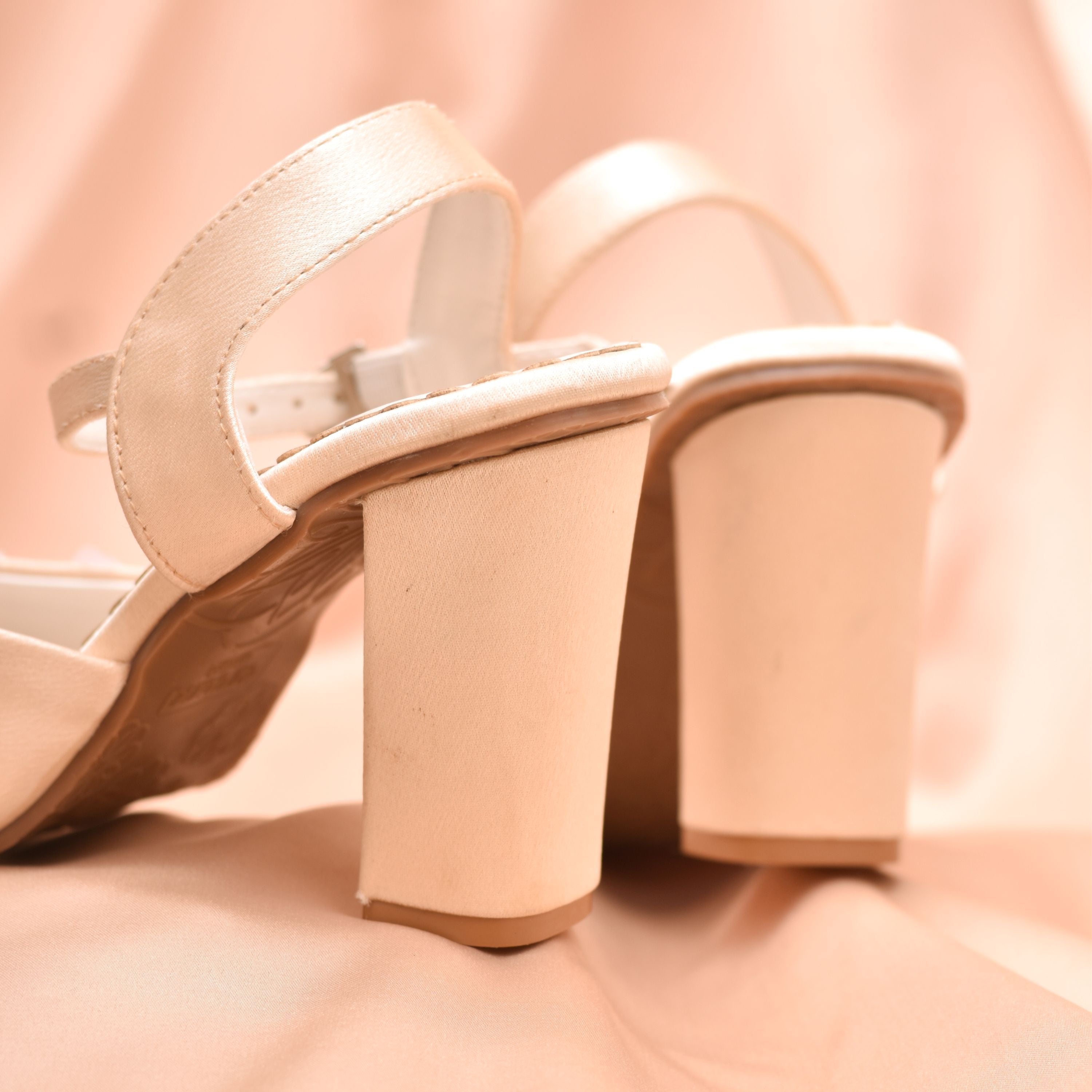 Beige high-heeled sandals for easy elevation
