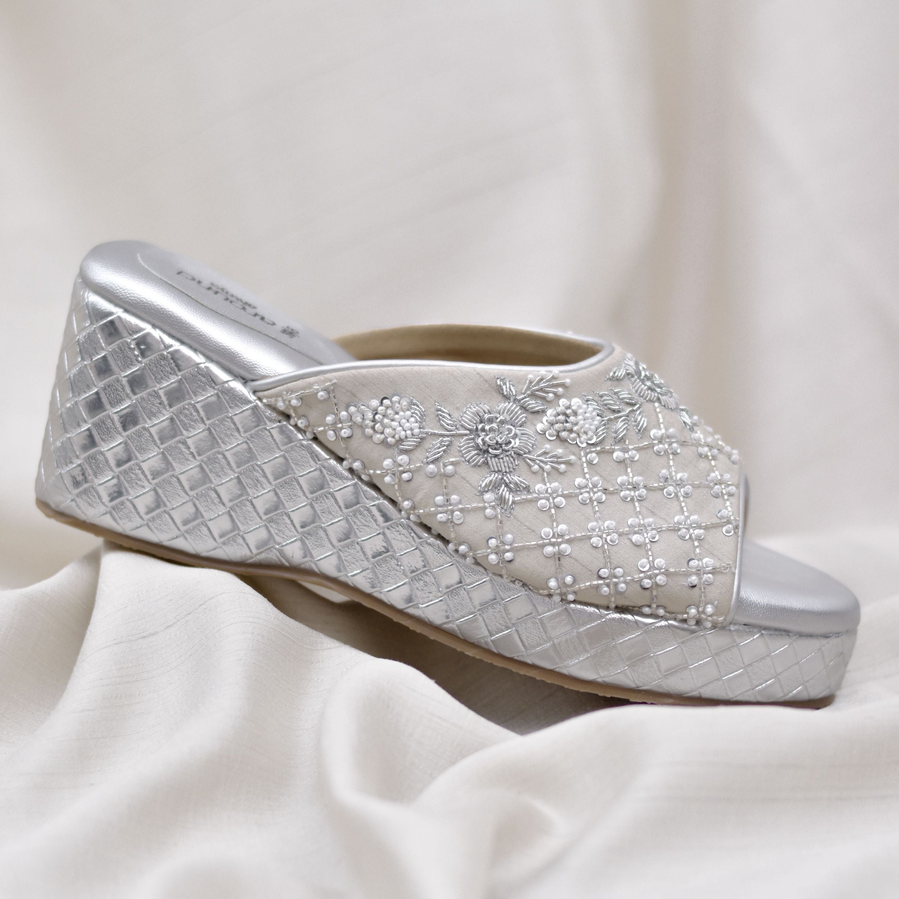 Pearl-accented party pair with silver textured finish heels